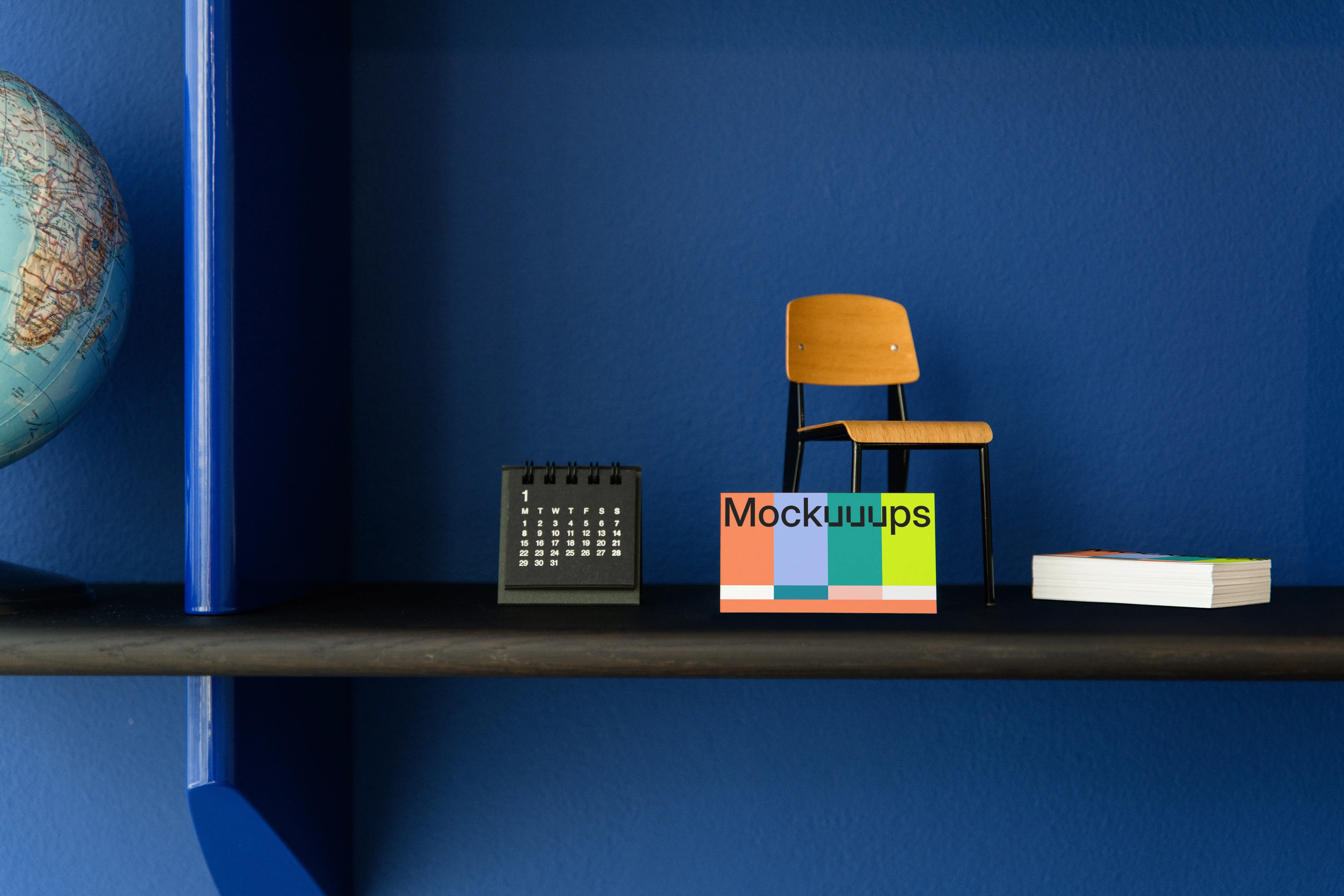 Business card mockup on decorative shelf with accessories