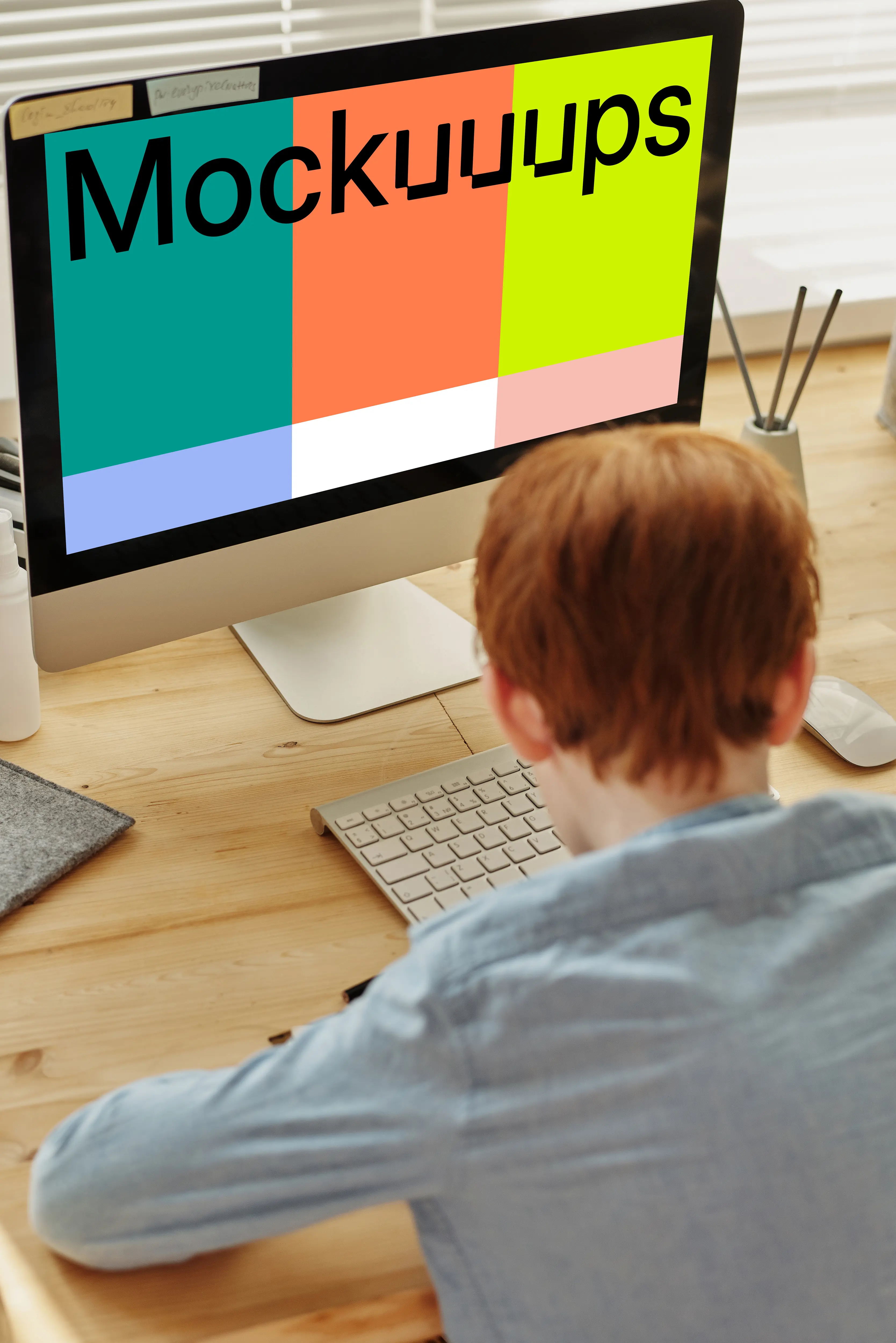 Computer Mockup of a Kid Using His iMac for School project