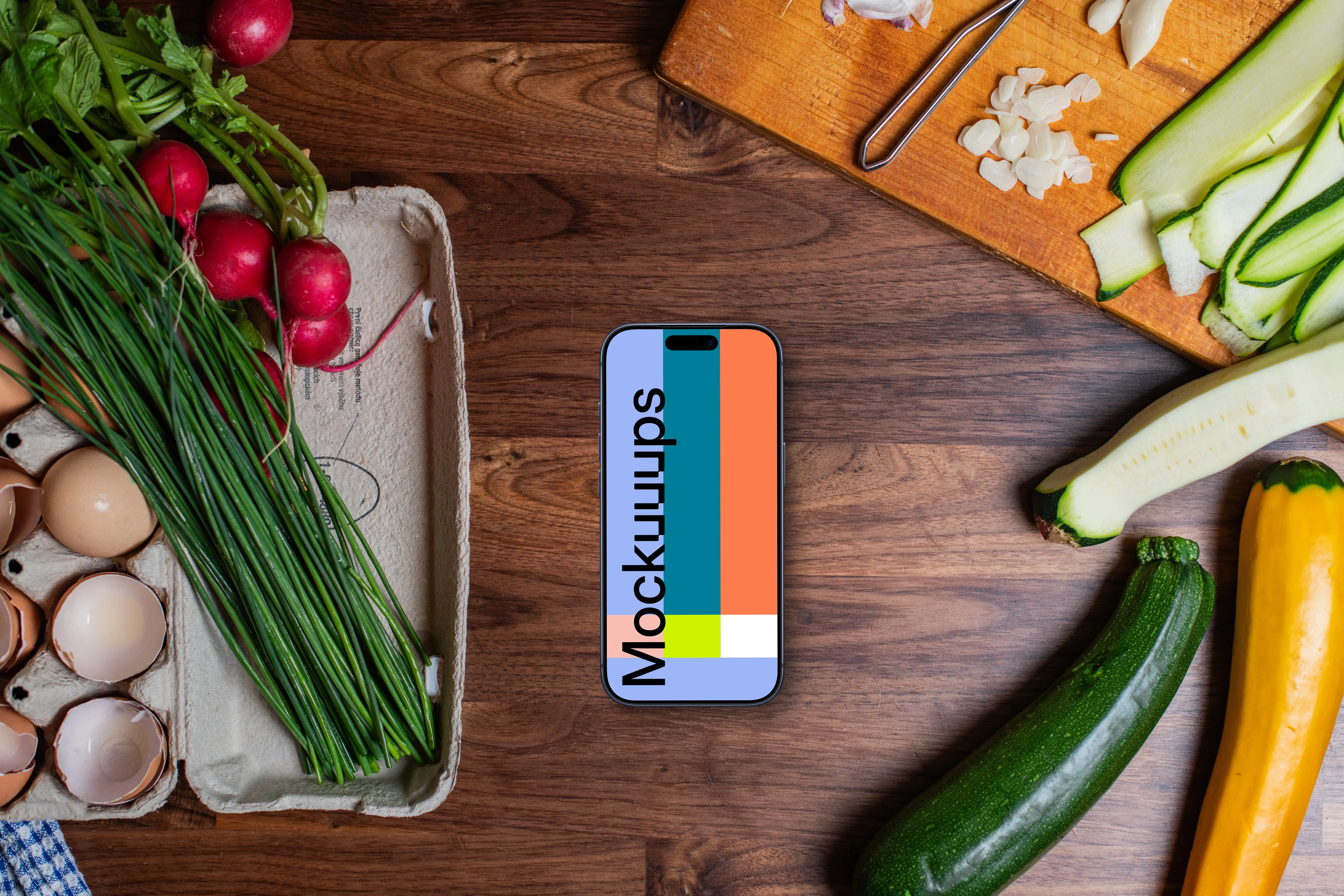 Delicious ingredients in the kitchen with phone mockup