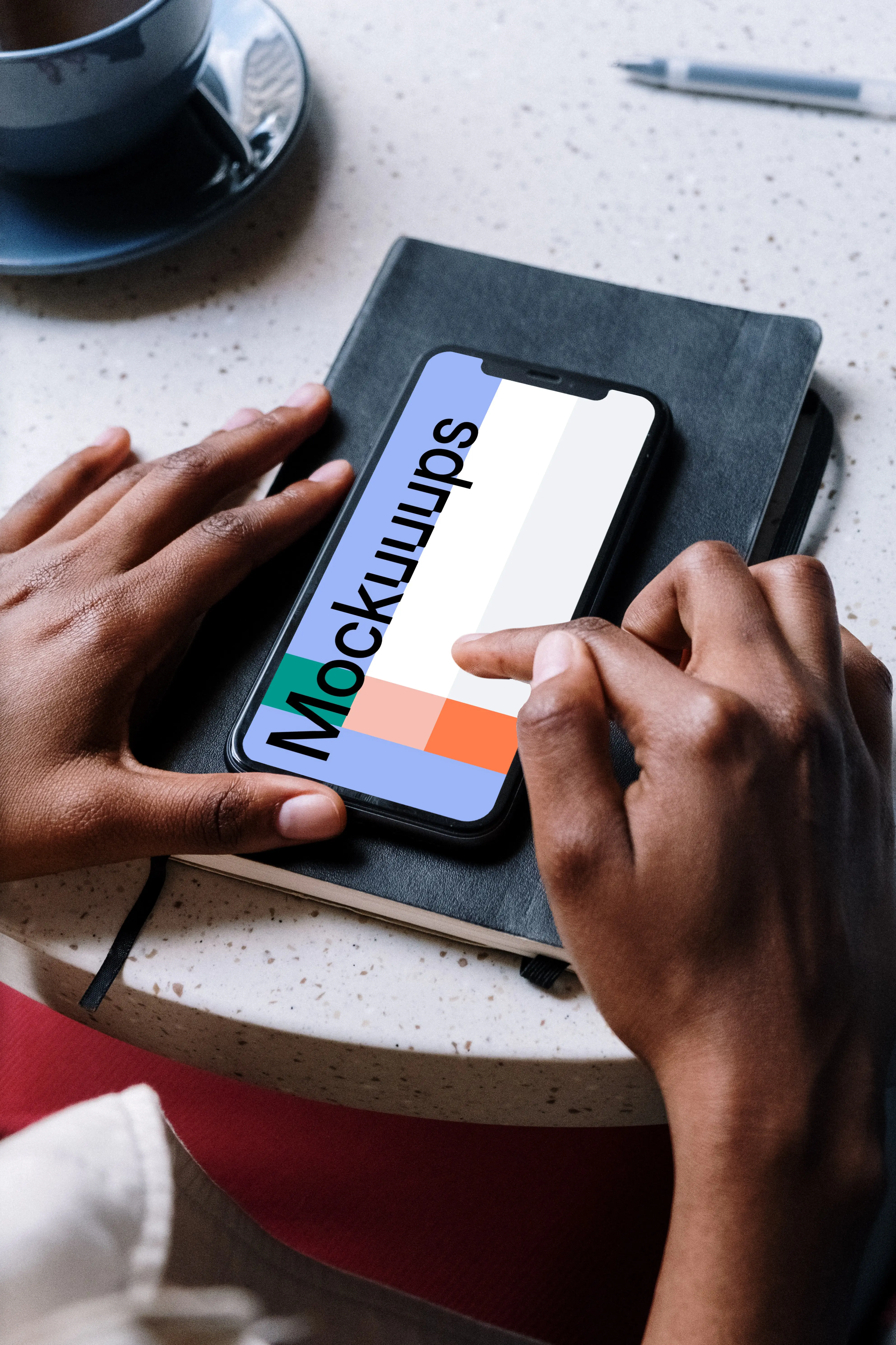 iPhone mockup on a notebook