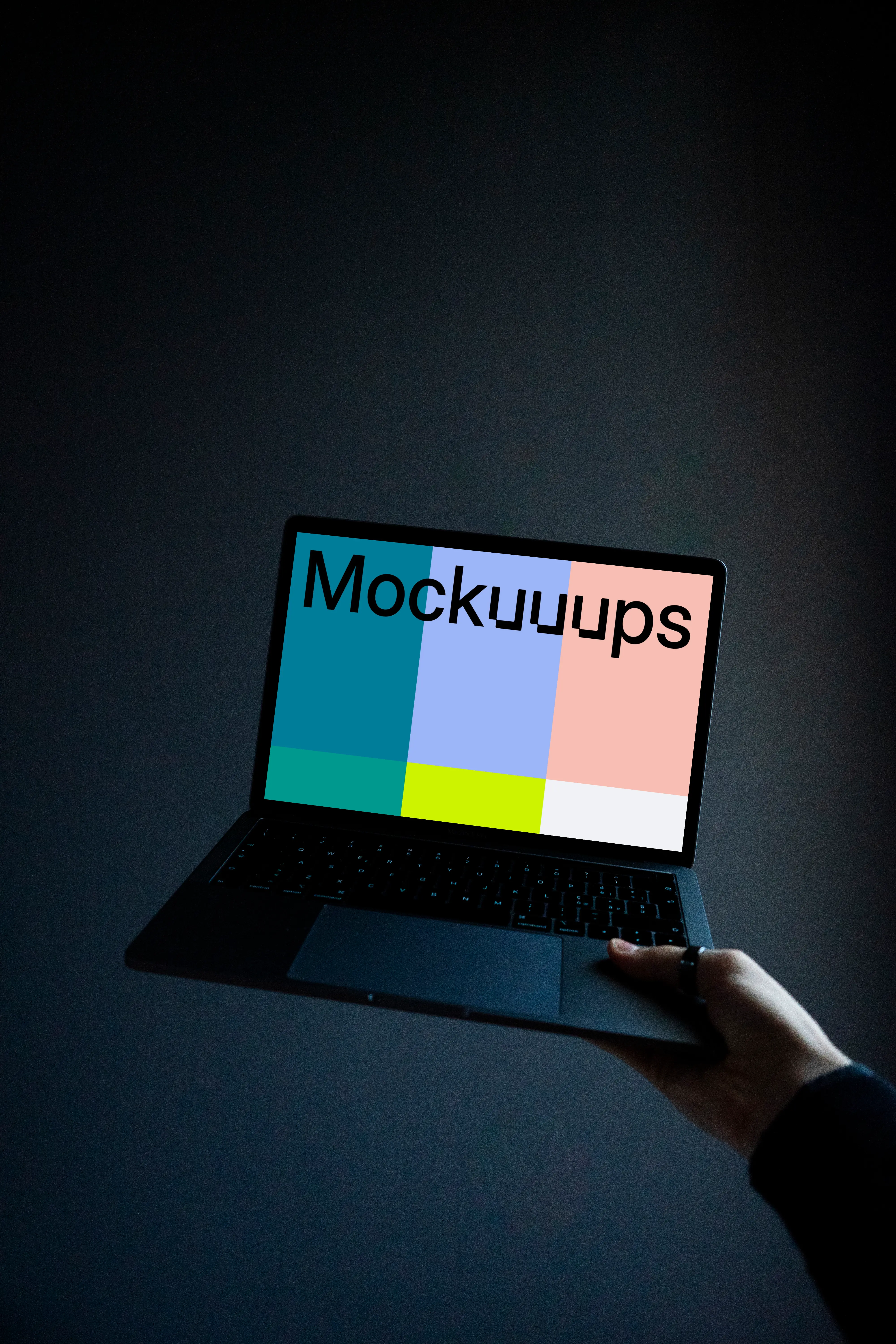 MacBook mockup in the dark environment