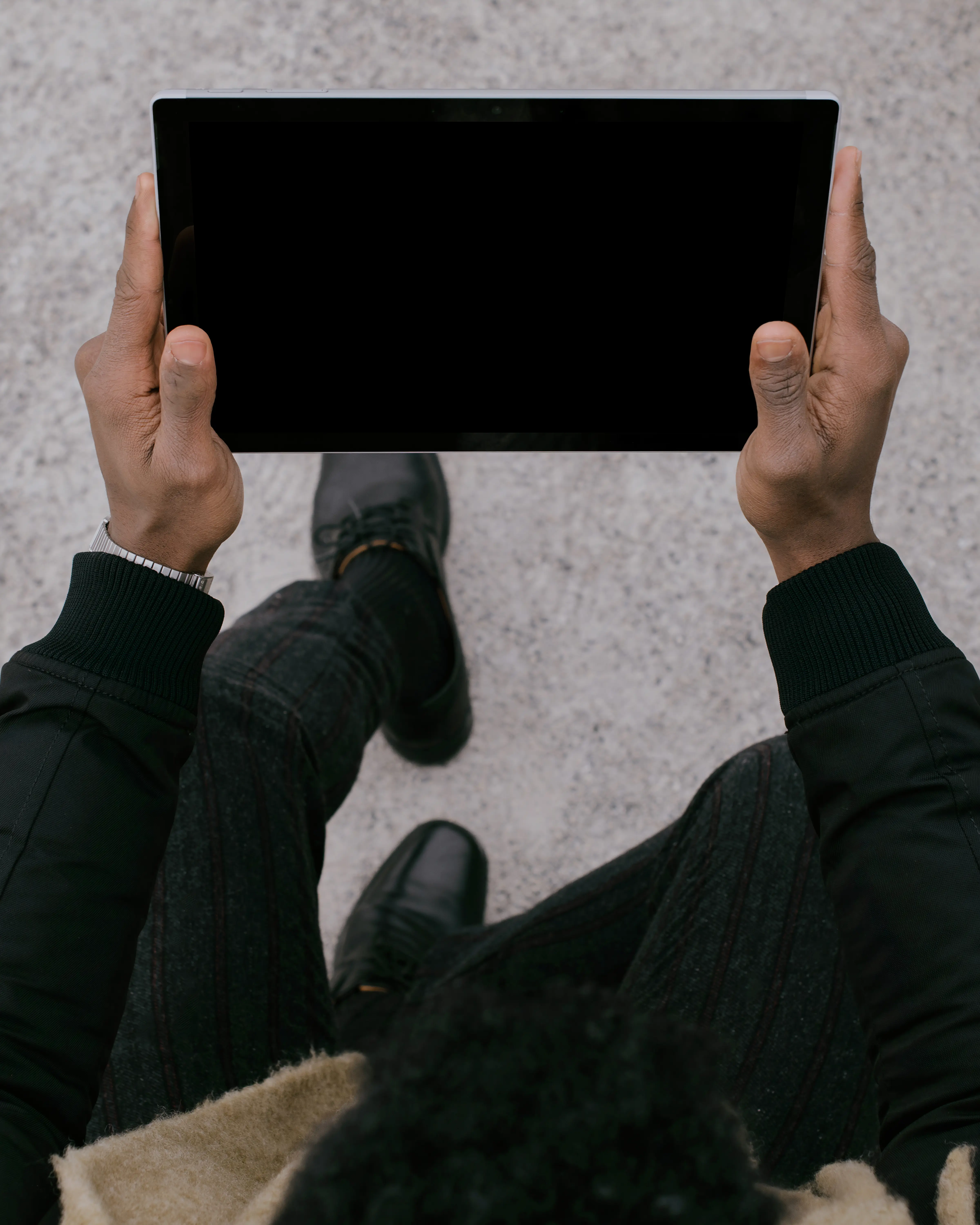 Microsoft Surface Laptop mockup held by a man