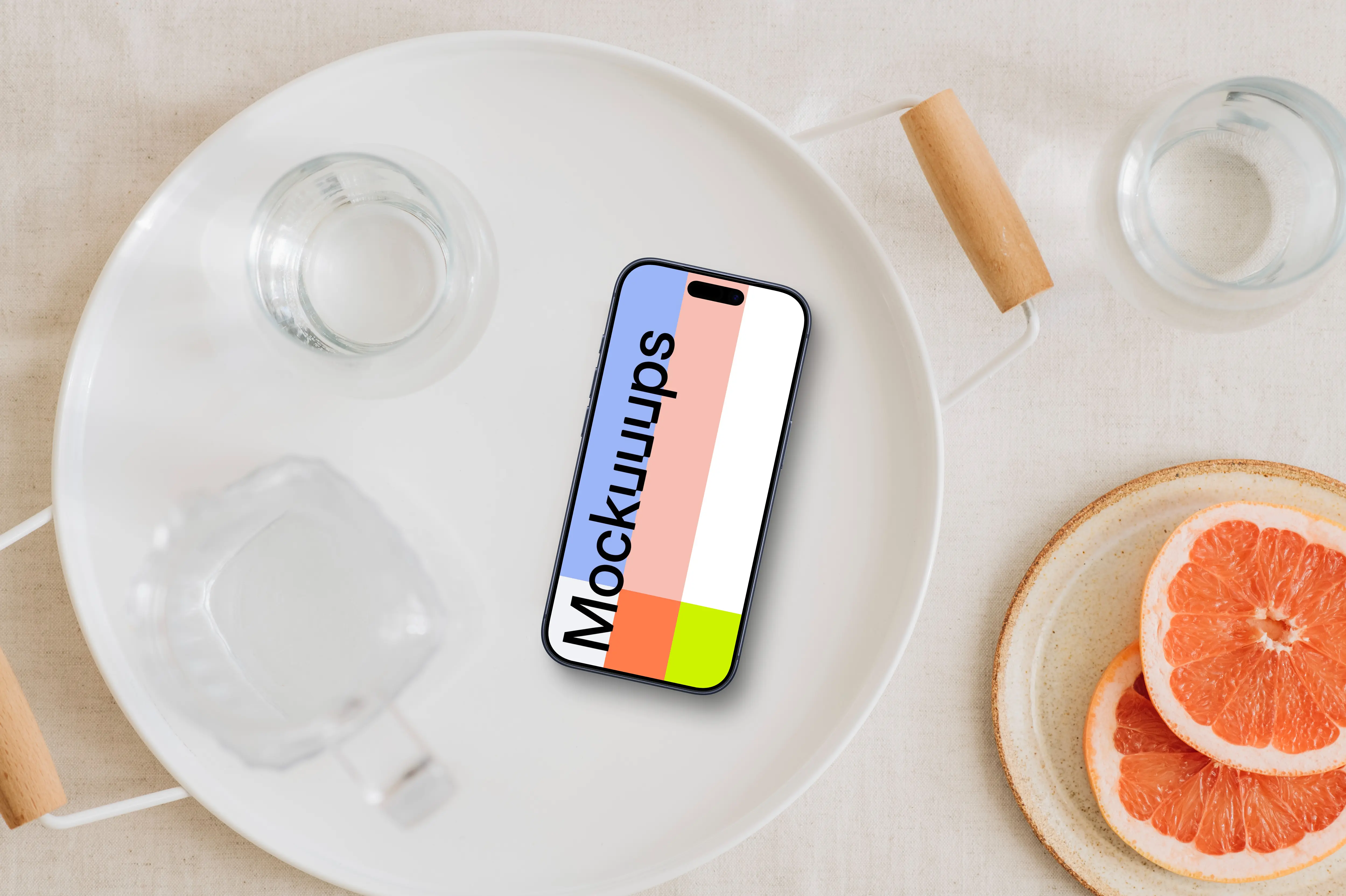 Minimalist table setting with an iPhone mockup