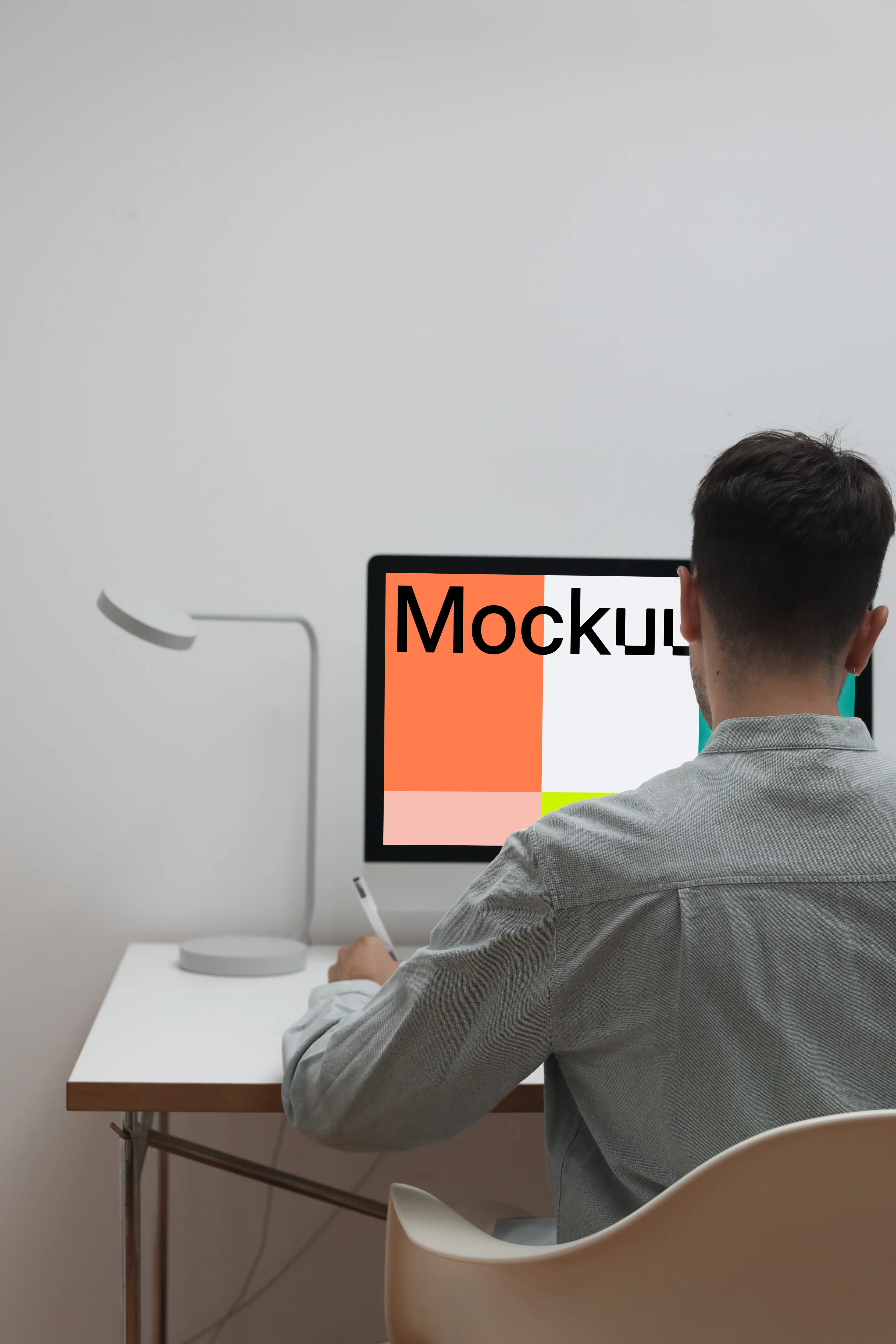 Mockup of a user working on an iMac