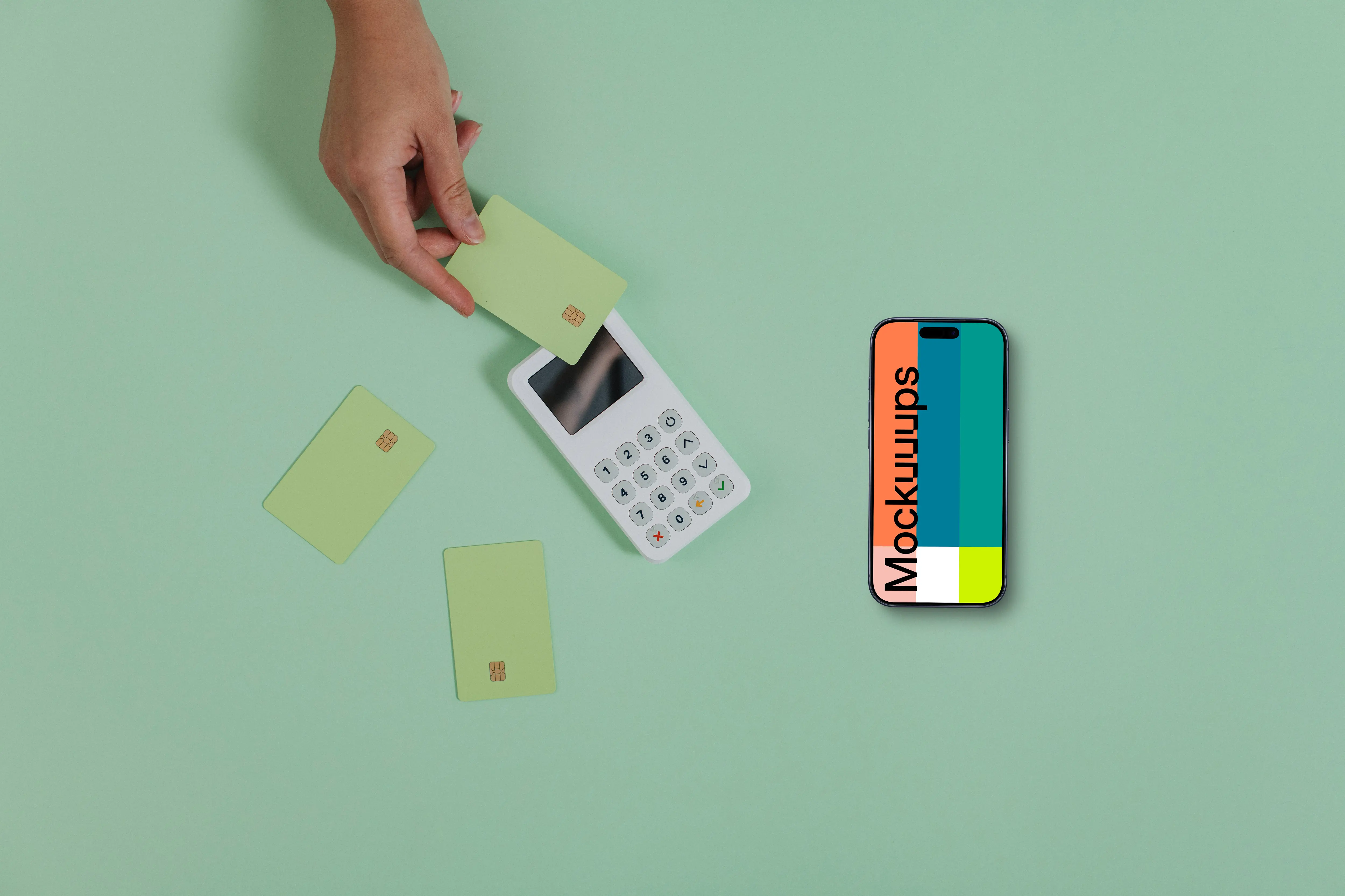 Pastel green styled iPhone mockup including payment terminal and credit cards