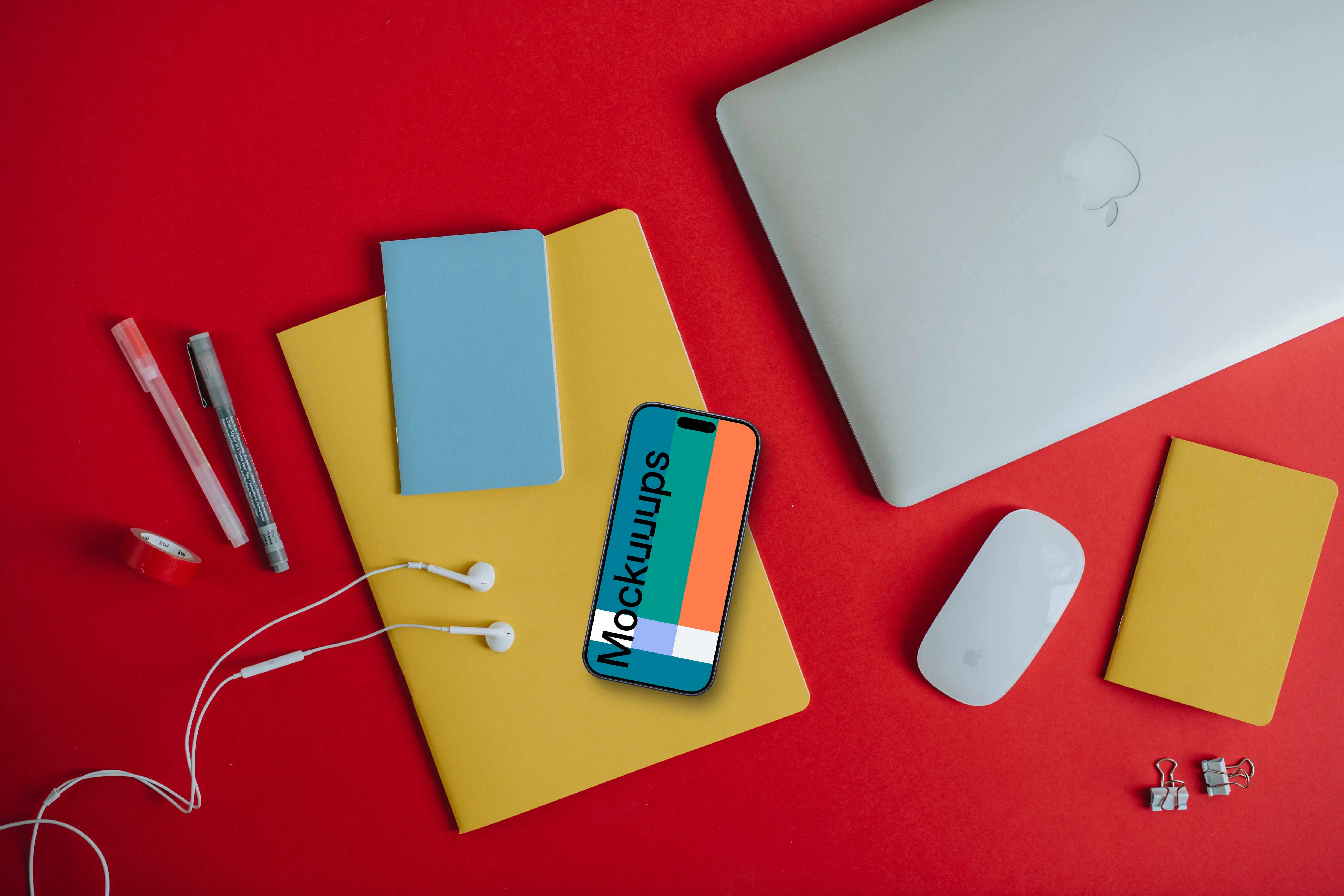 Phone mockup on the red background and laptop on the side