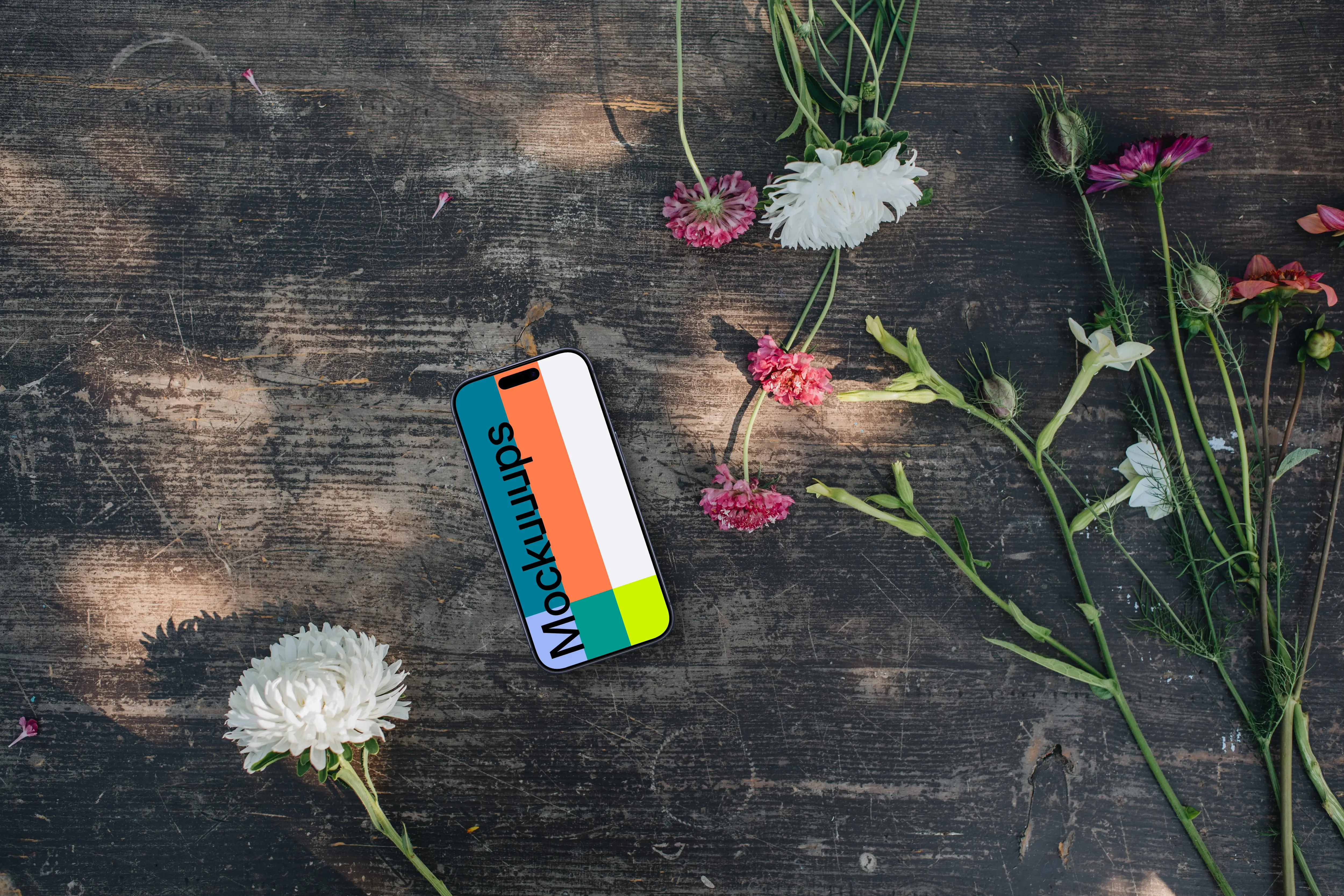 Phone mockup surrounded by flowers