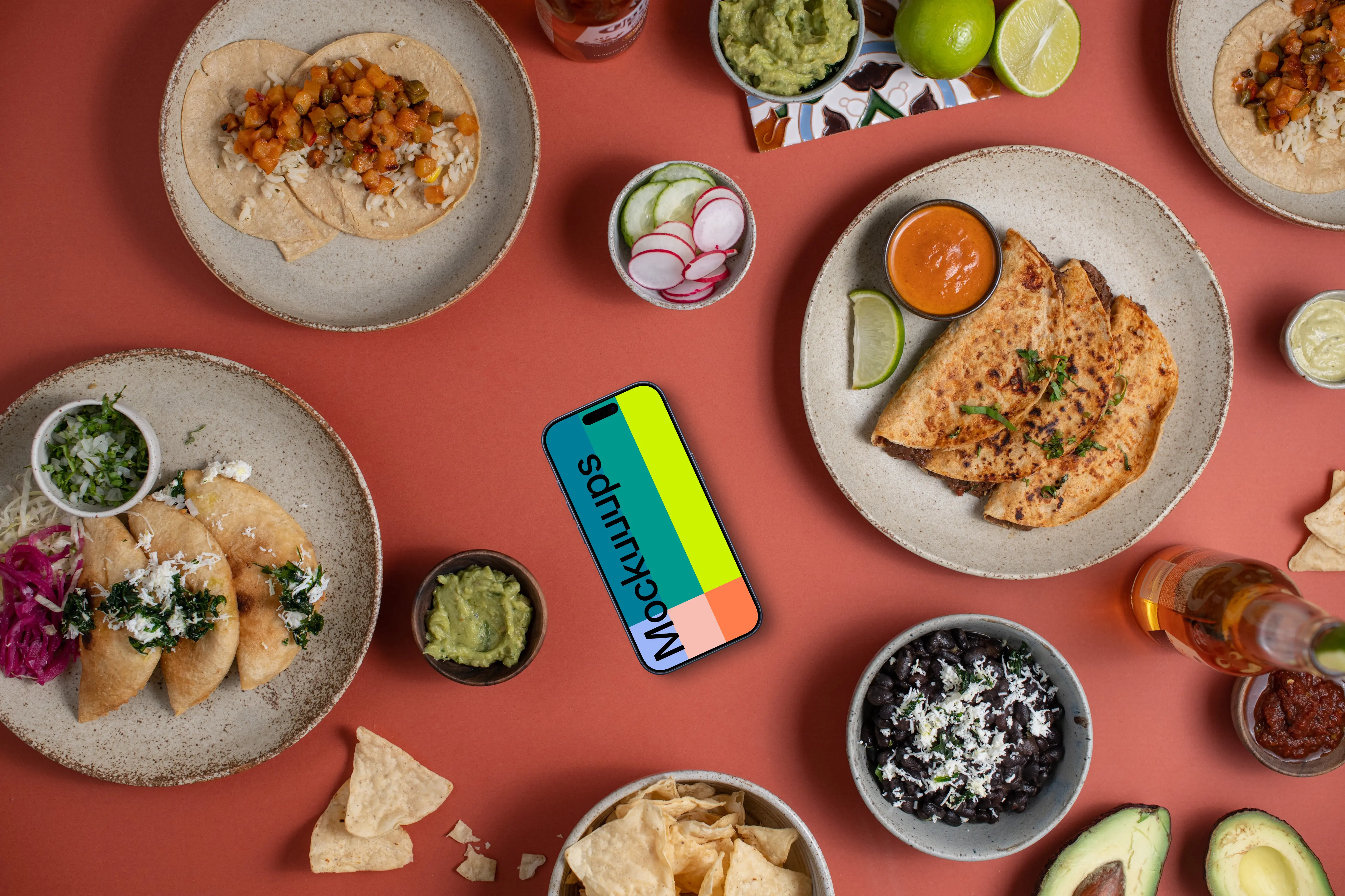 Phone mockup surrounded by Mexican food