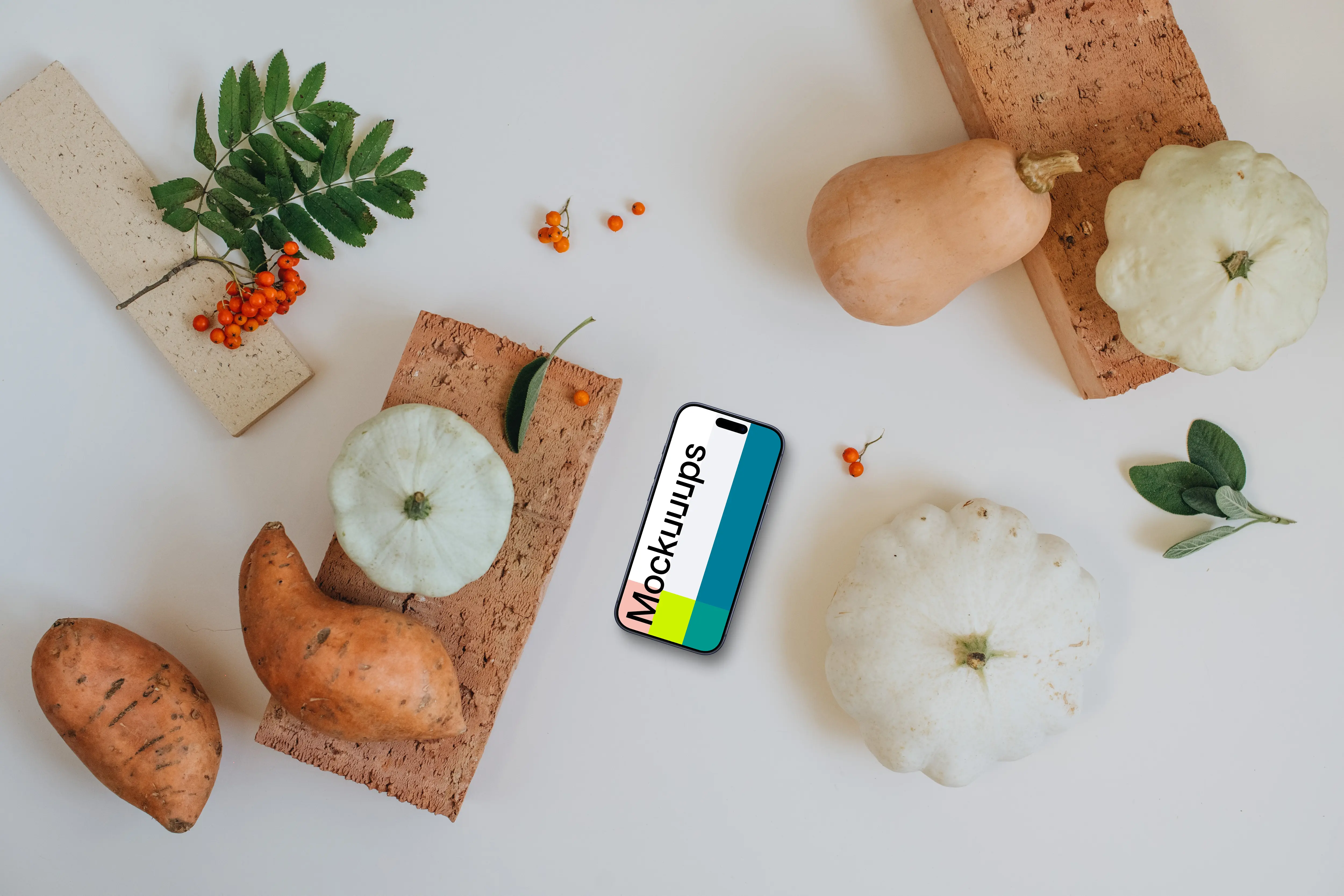 Phone mockup surrounded by vegetables