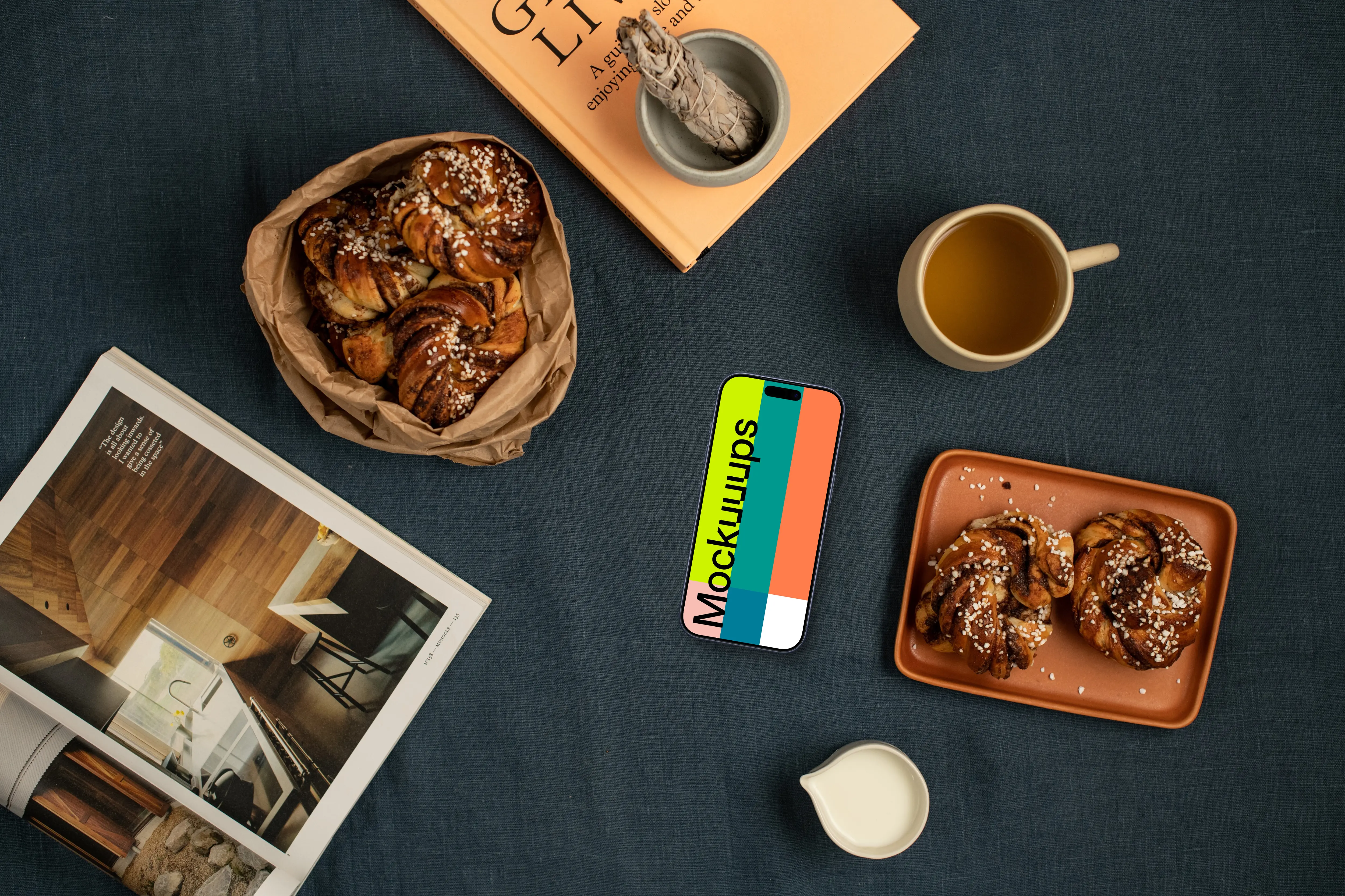 Smartphone mockup nearby pastries