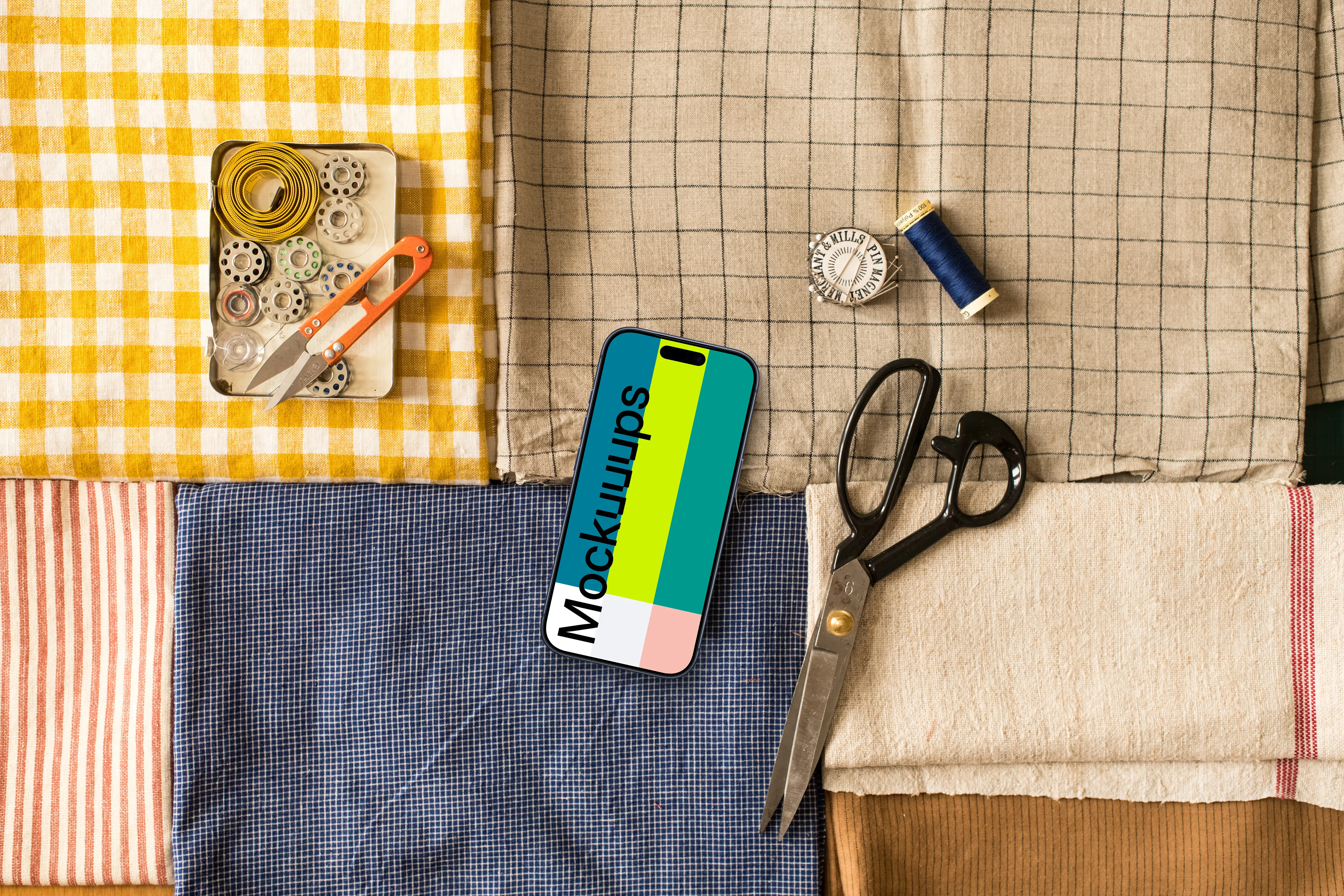 Smartphone mockup on folded cloths