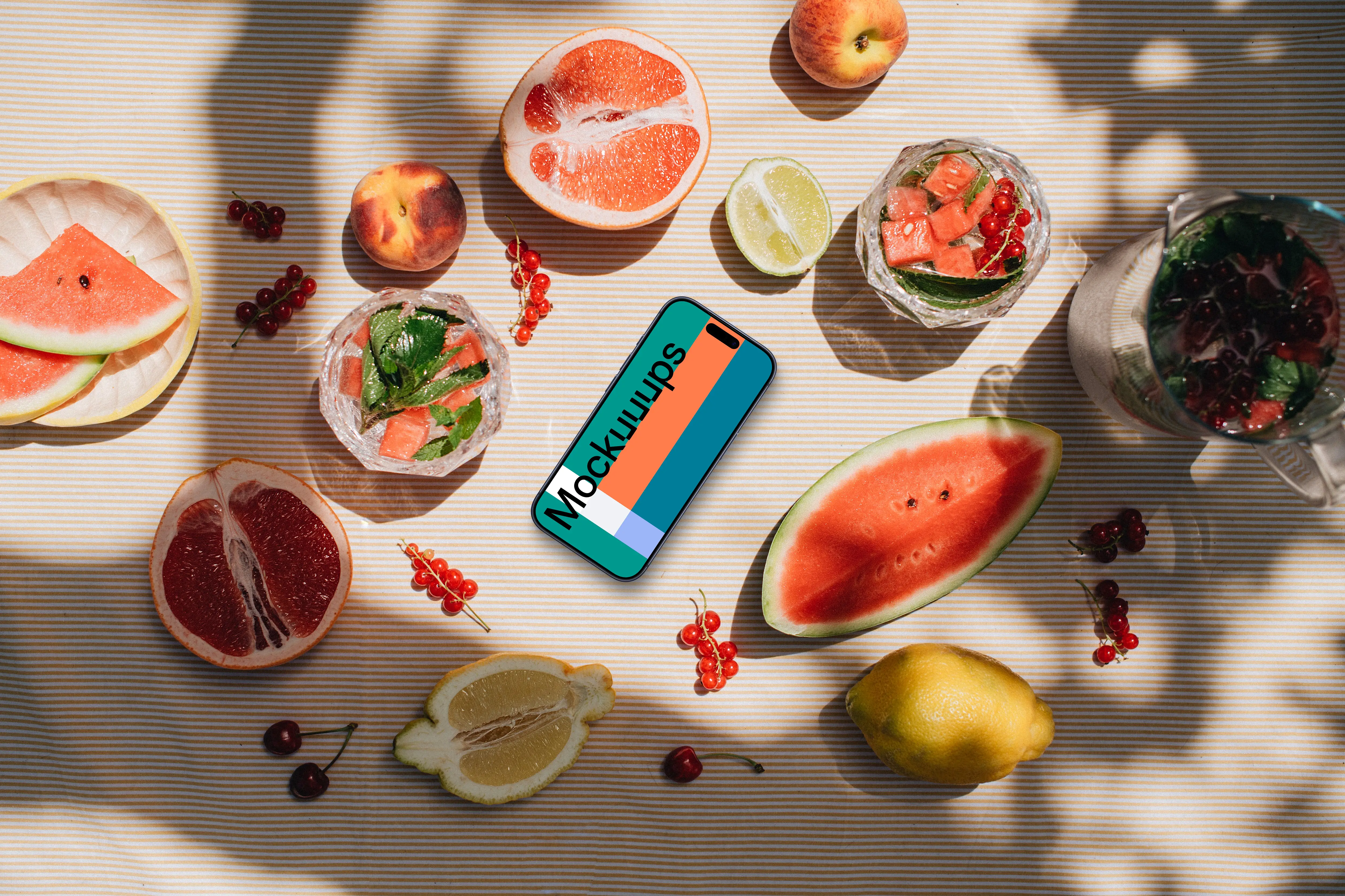 Smartphone mockup with a watermelon on the table