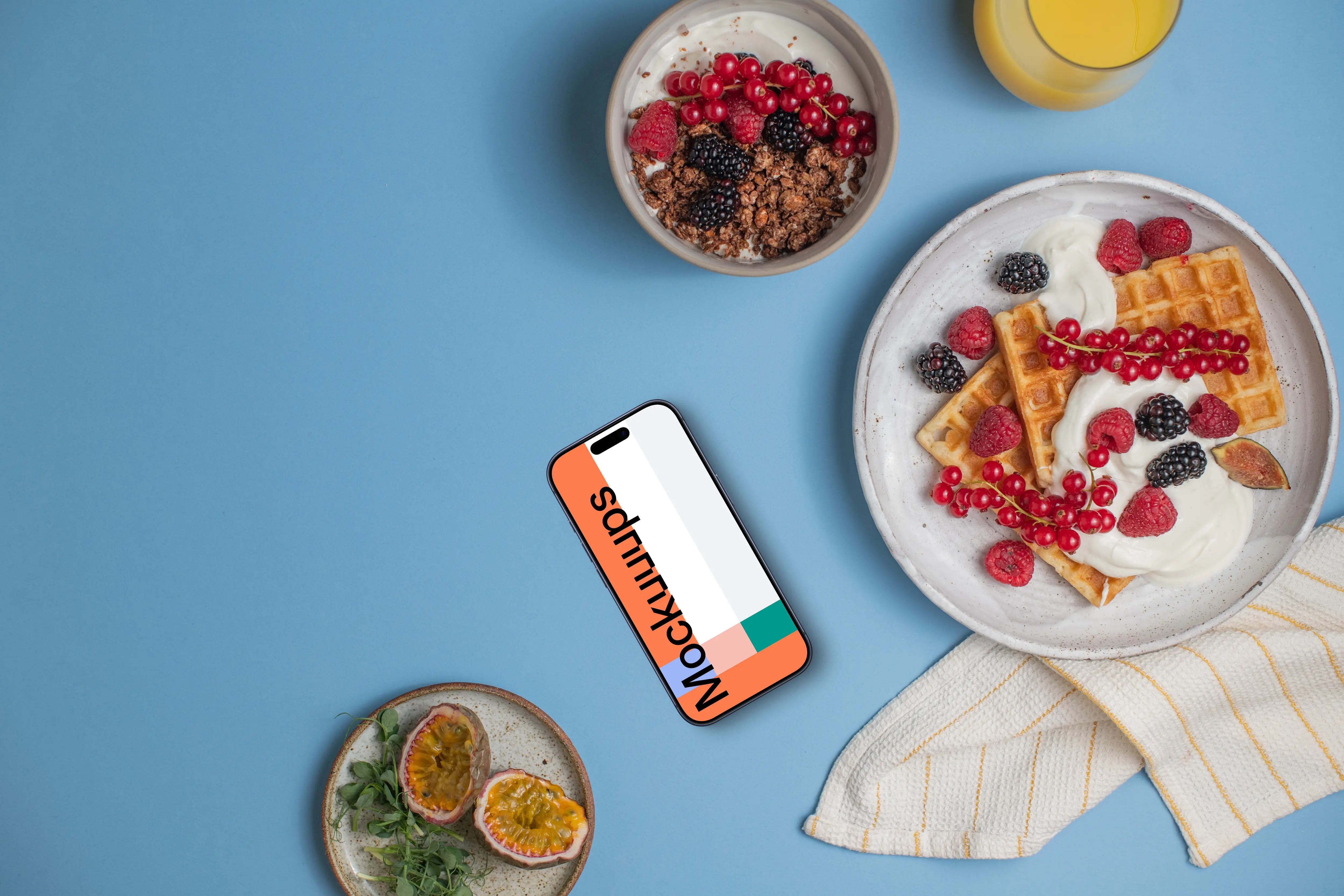 Smartphone mockup with breakfast plates