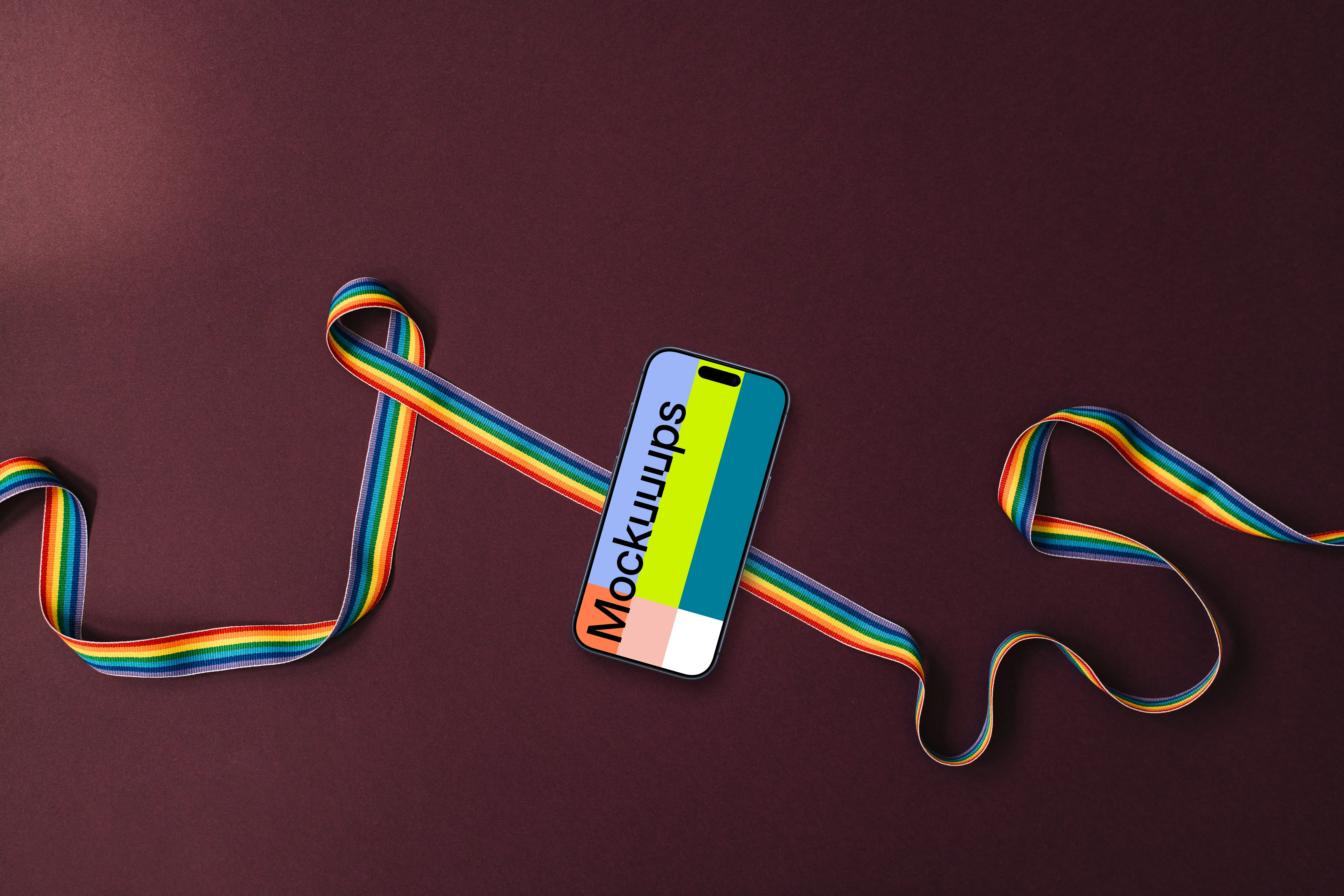 Smartphone placed on a twisted pride ribbon