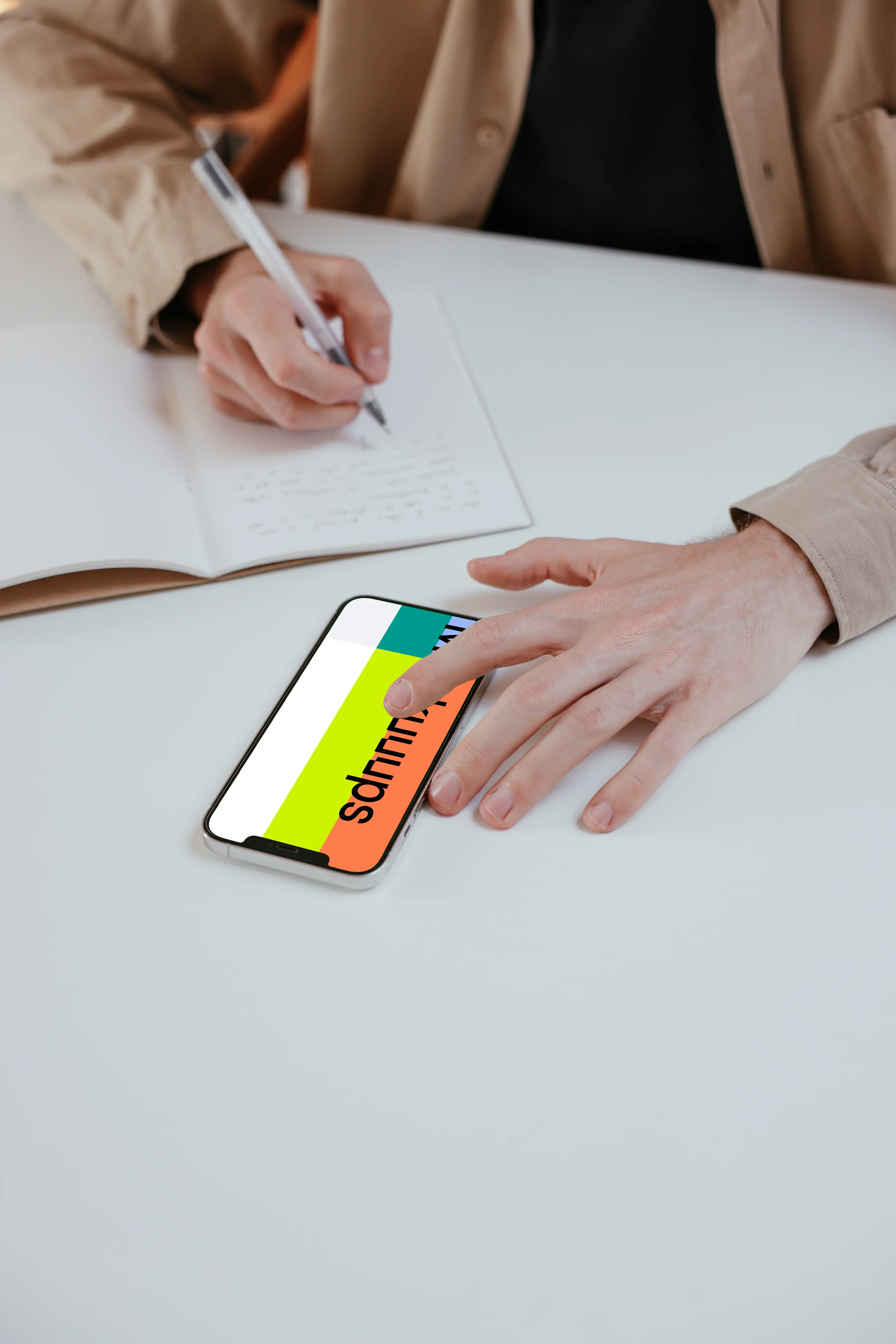 User writing from an iPhone mockup