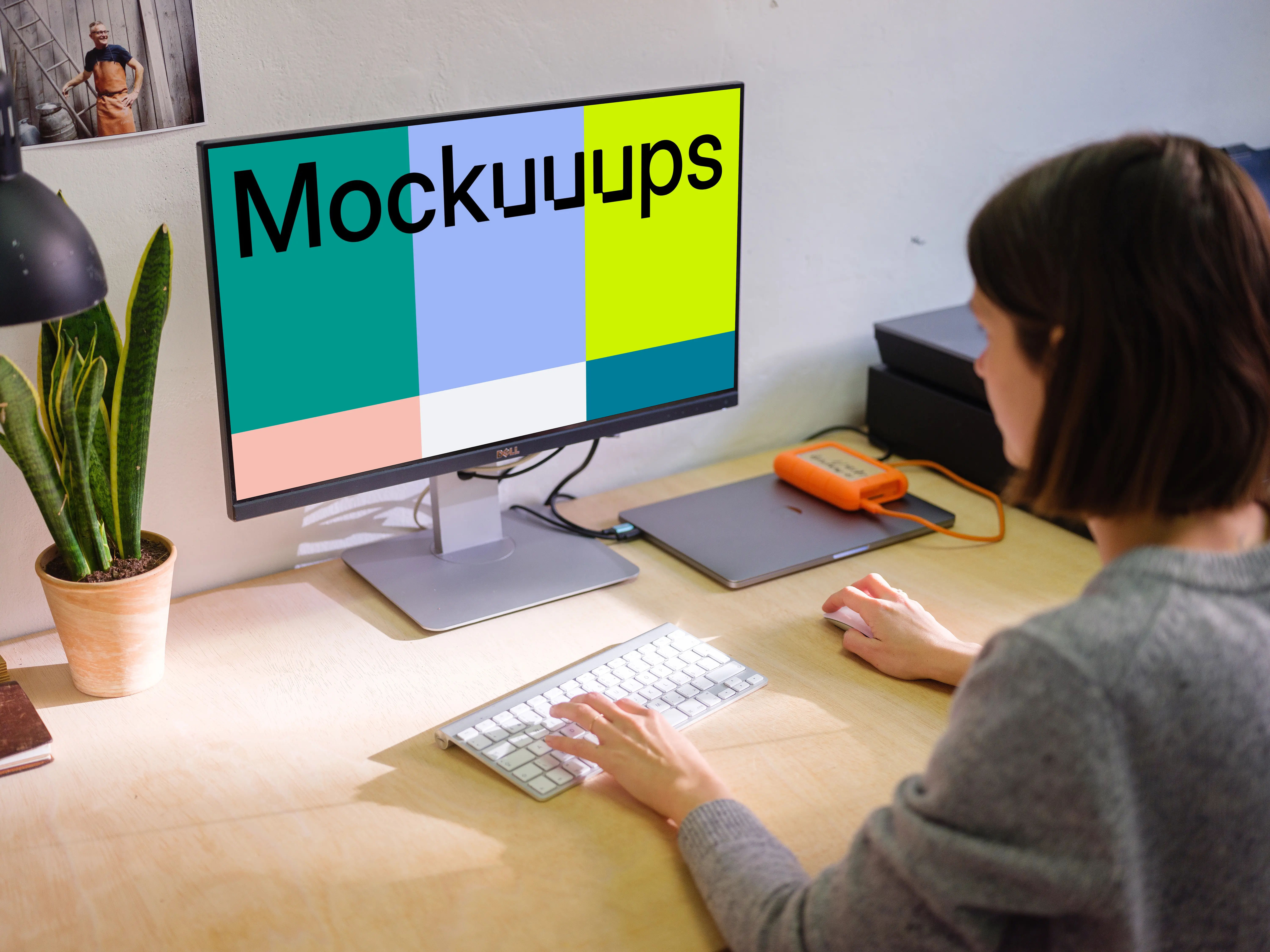 Woman working on Dell display mockup