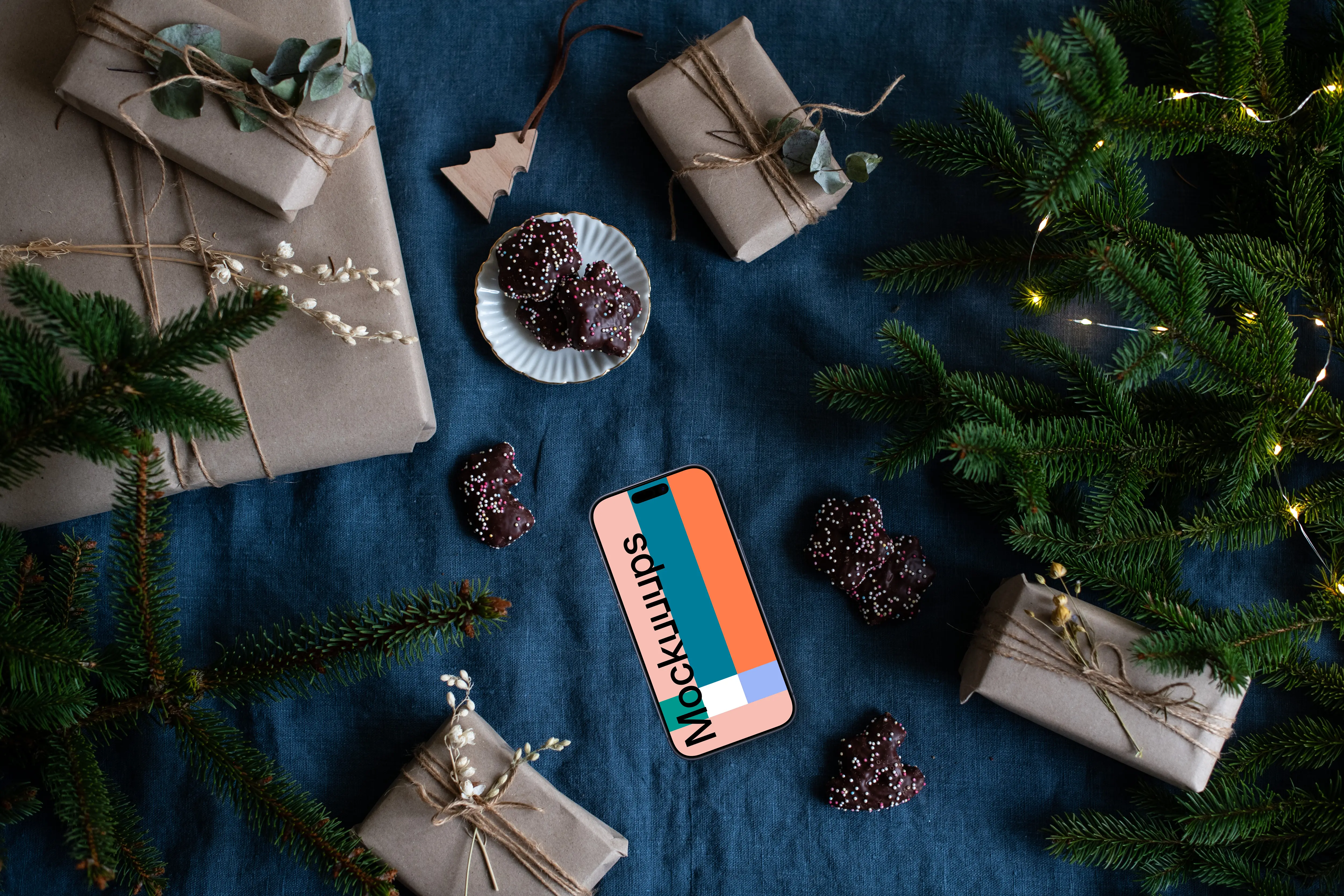 Xmas phone mockup with gifts on the side