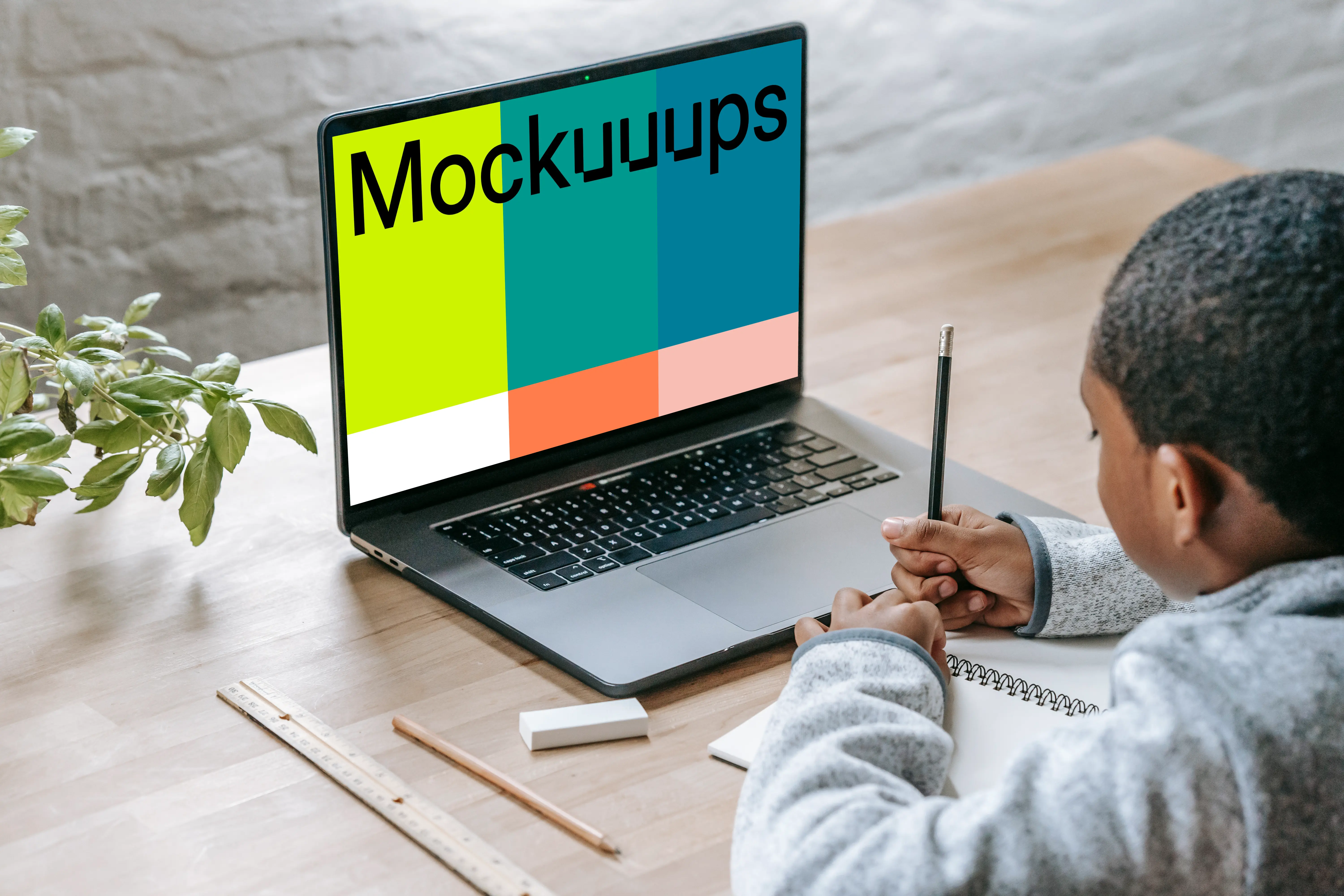 Young boy using laptop mockup