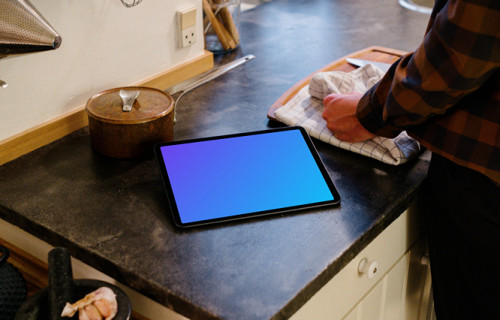 iPad Air Mockup on a kitchen counter beside a pot