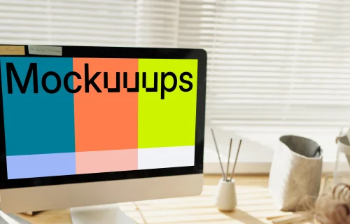 Child playing in front of an iMac computer mockup