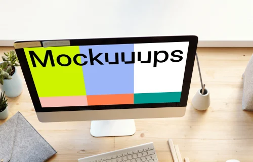 Dark haired kid using an iMac mockup