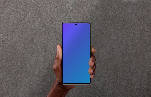 Holding smartphone mockup against the wall background