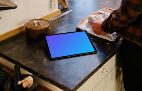 iPad Air Mockup on a kitchen counter beside a pot