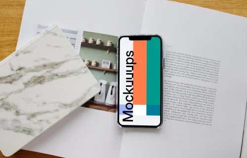 iPhone 12 Pro mockup on a magazine