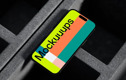 iPhone 16 mockup on concrete backdrop