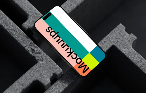 iPhone 16 mockup placed on concrete blocks