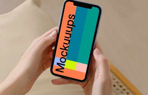 iPhone mockup in a female user’s hand wearing a skirt