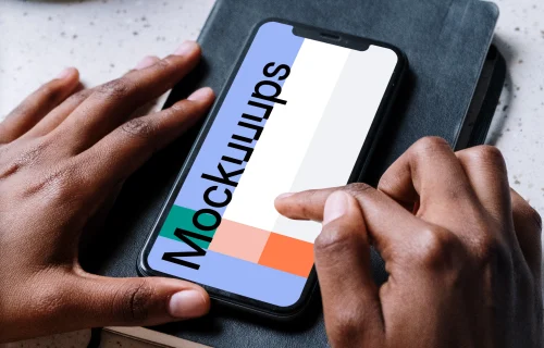 iPhone mockup on a notebook