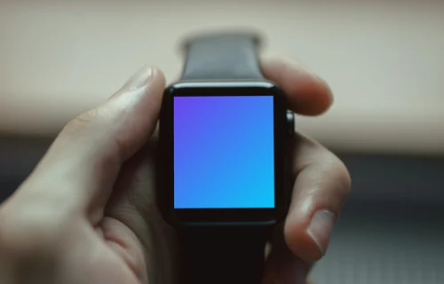 Holding black Apple Watch mockup firmly