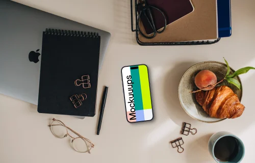 Smartphone mockup on the wooden desk