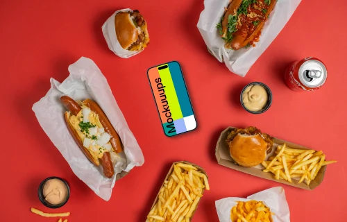 Smartphone mockup surrounded by fast food