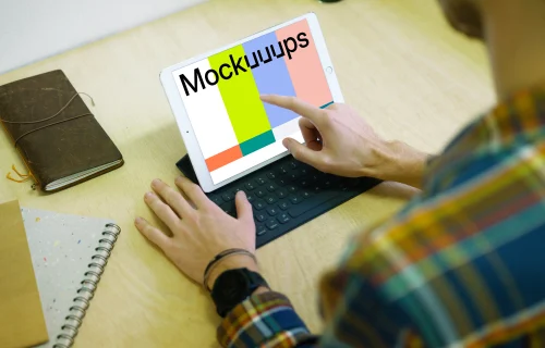 Tapping on iPad Pro mockup with keyboard