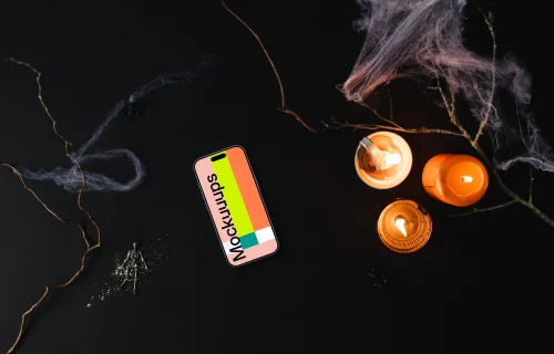 Top view of halloween pumpkin mockup with a smartphone