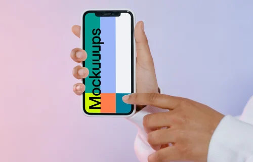 User pointing at iPhone mockup