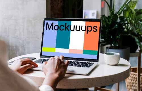 White MacBook mockup close up  on the table