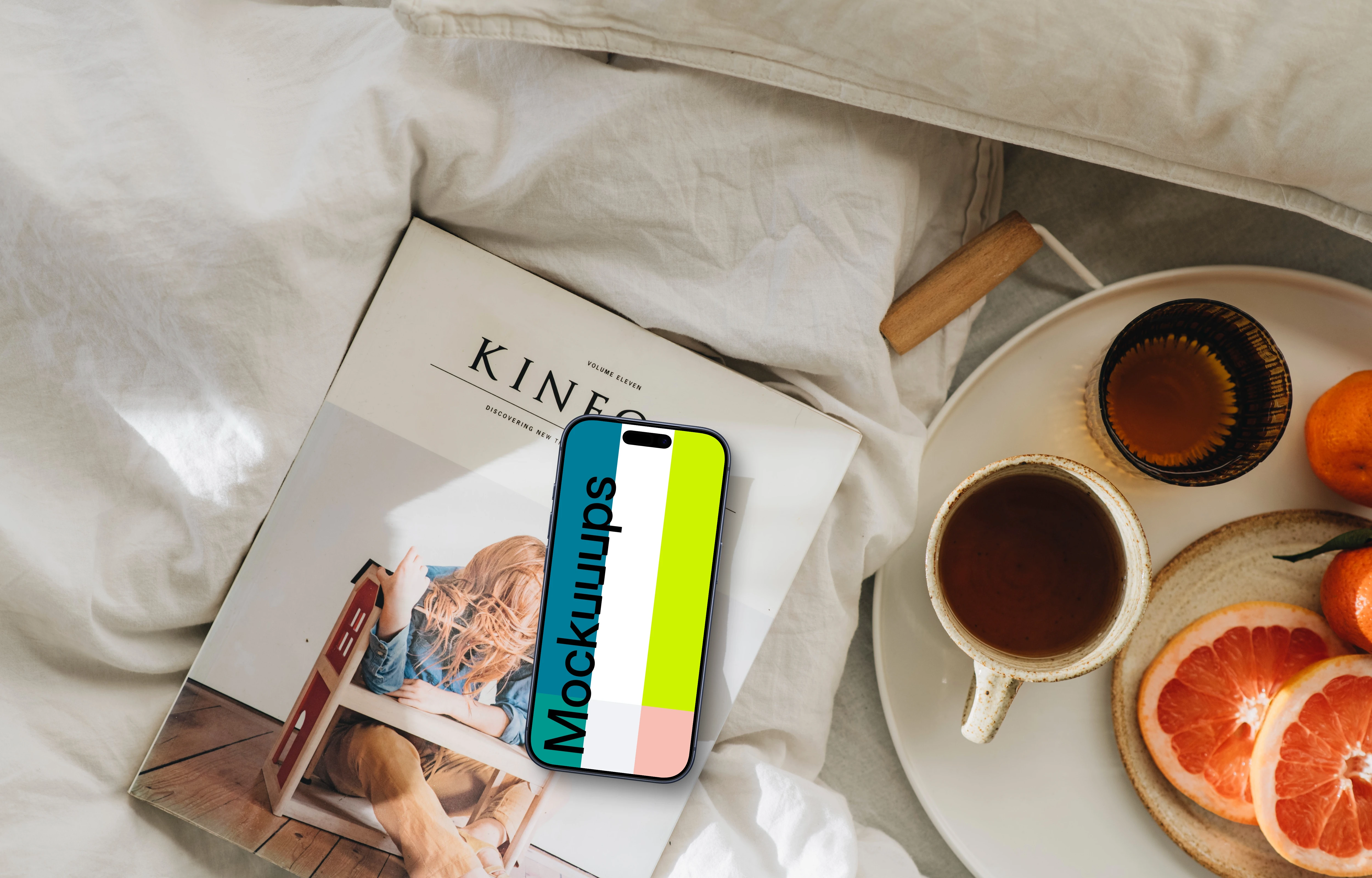 Breakfast in bed spread with an iPhone mockup
