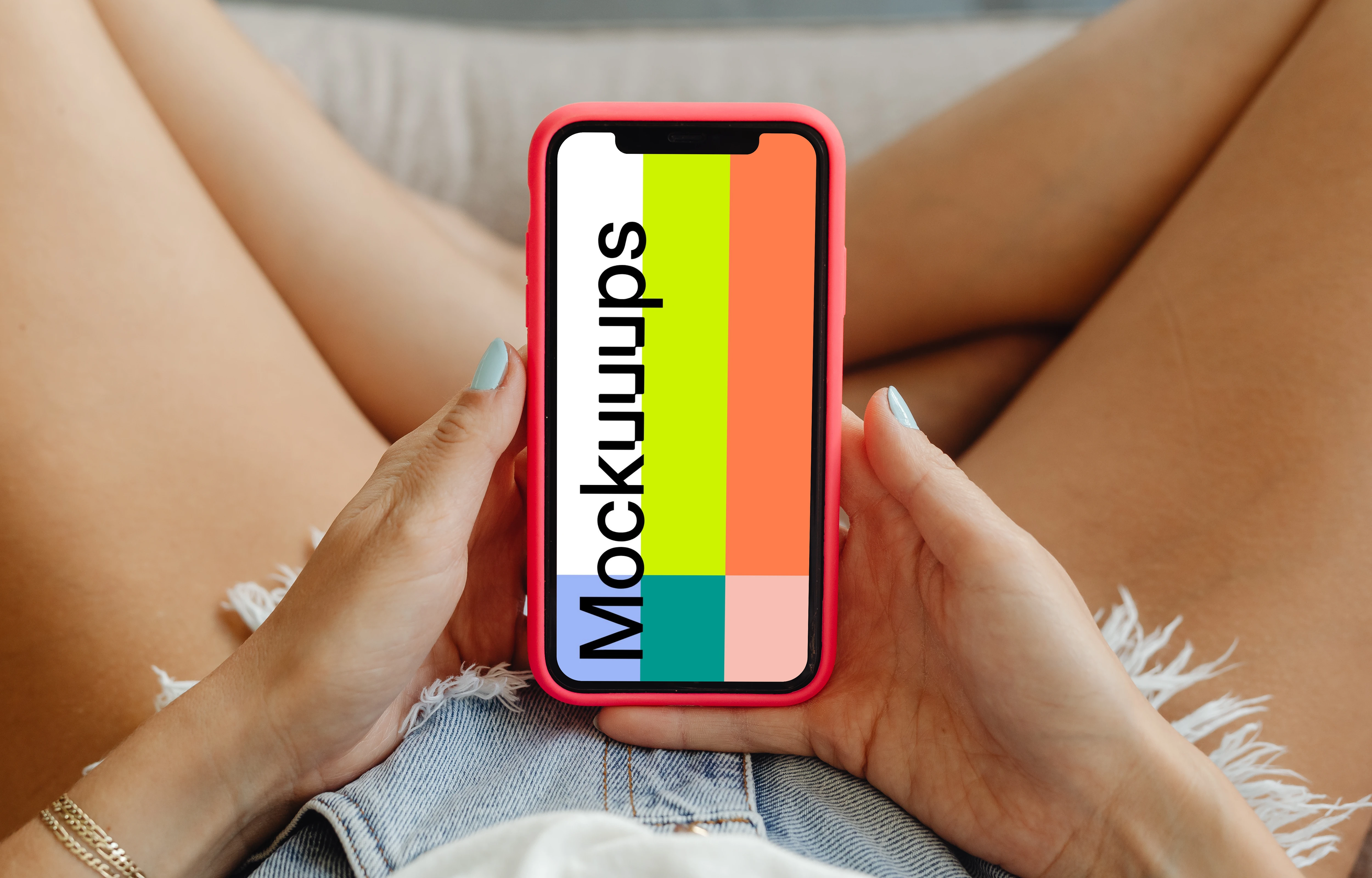 Closeup iPhone Mockup on held by a female user in jean shorts