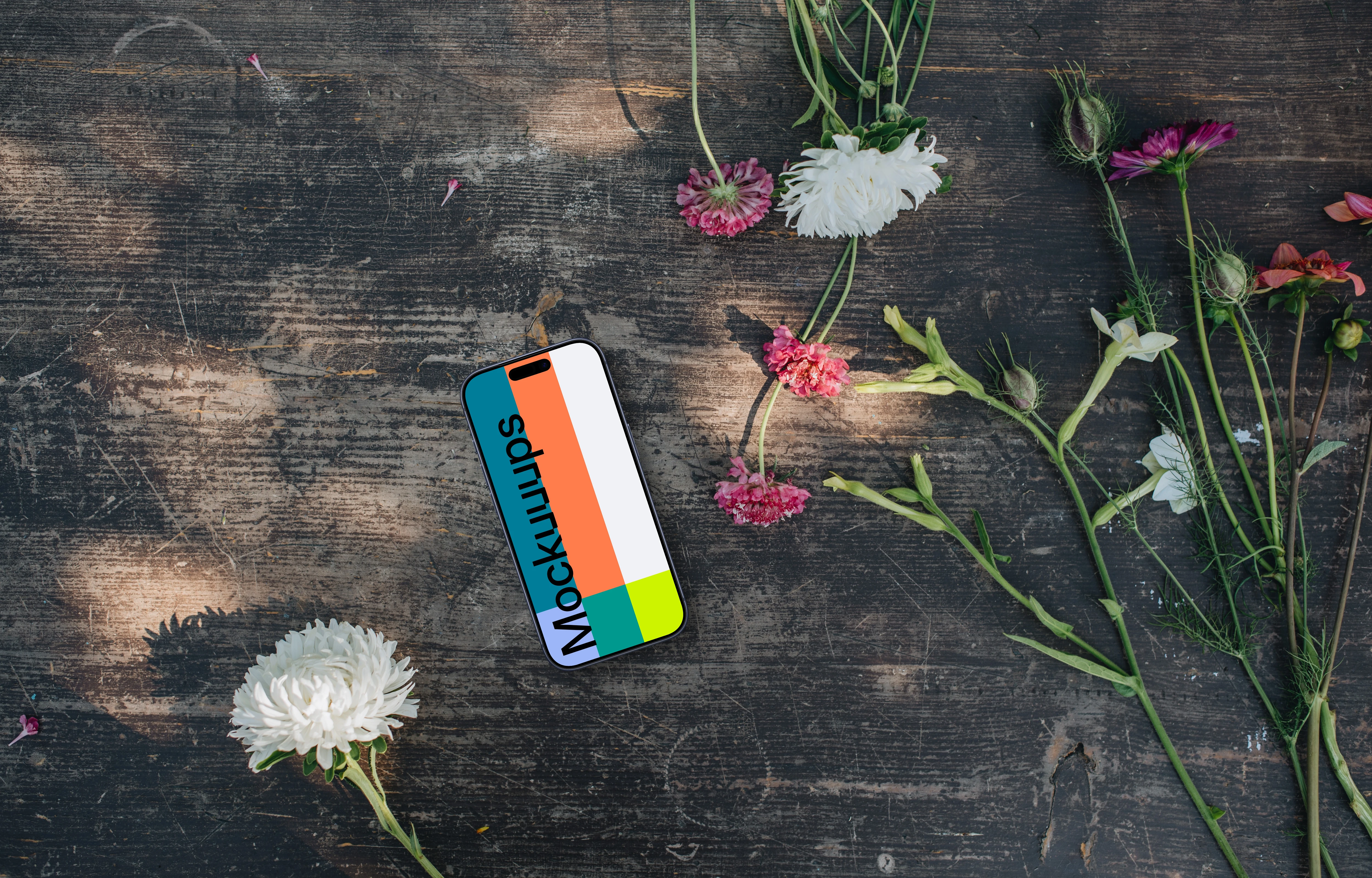 Phone mockup surrounded by flowers