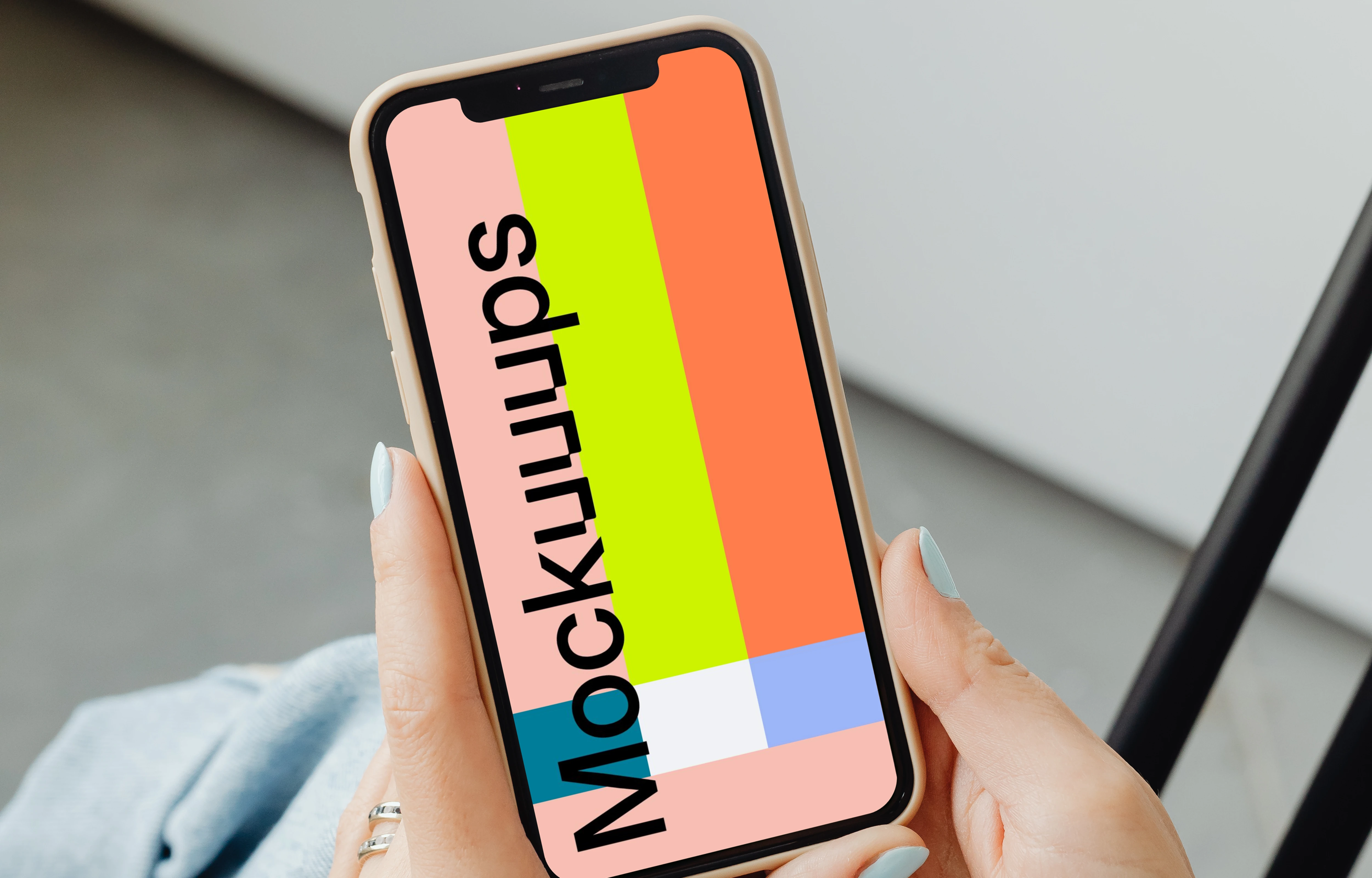 A simple handheld iPhone mockup help above the laps of a user