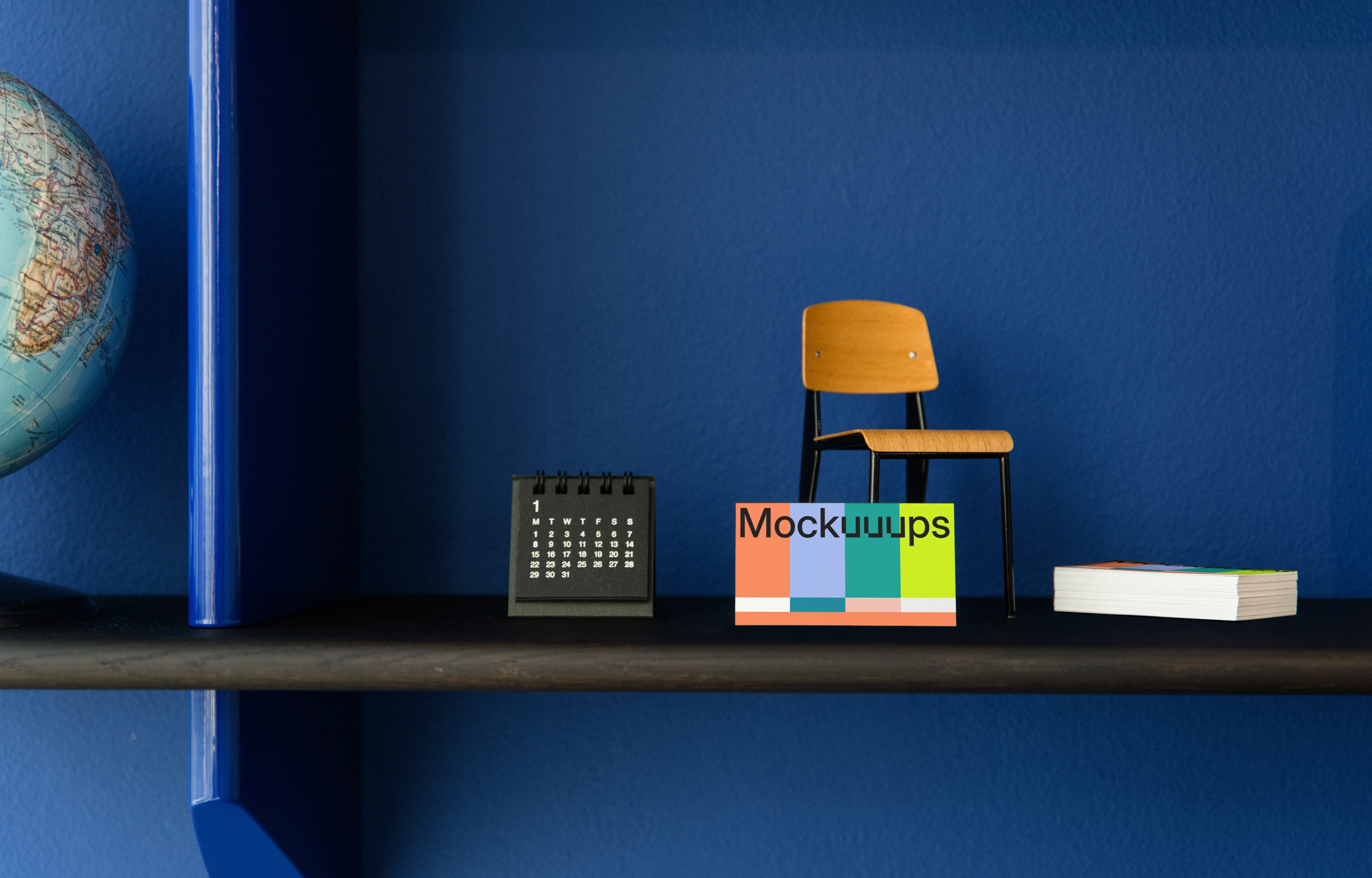 Business card mockup on decorative shelf with accessories