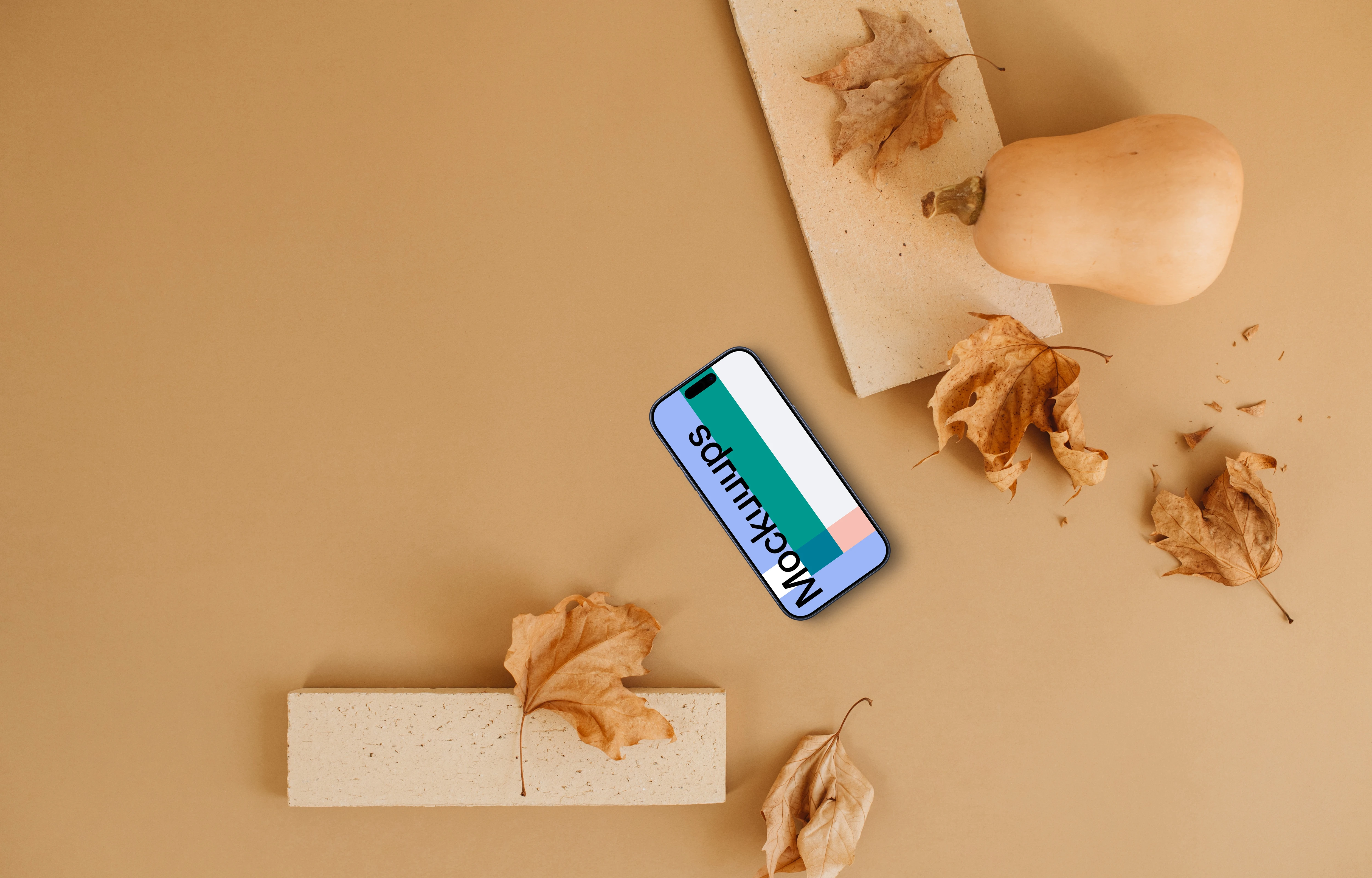 Smartphone mockup surrounded by leaves