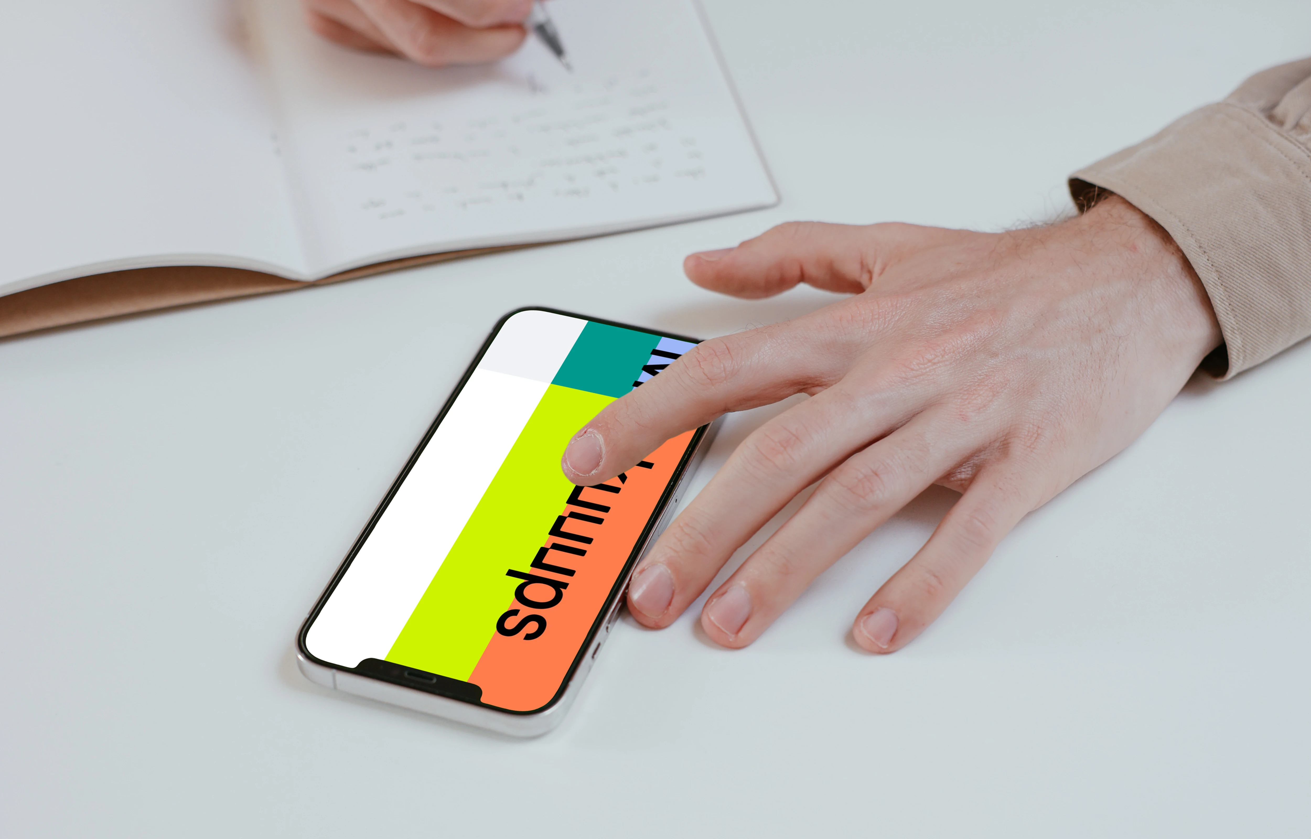 User writing from an iPhone mockup