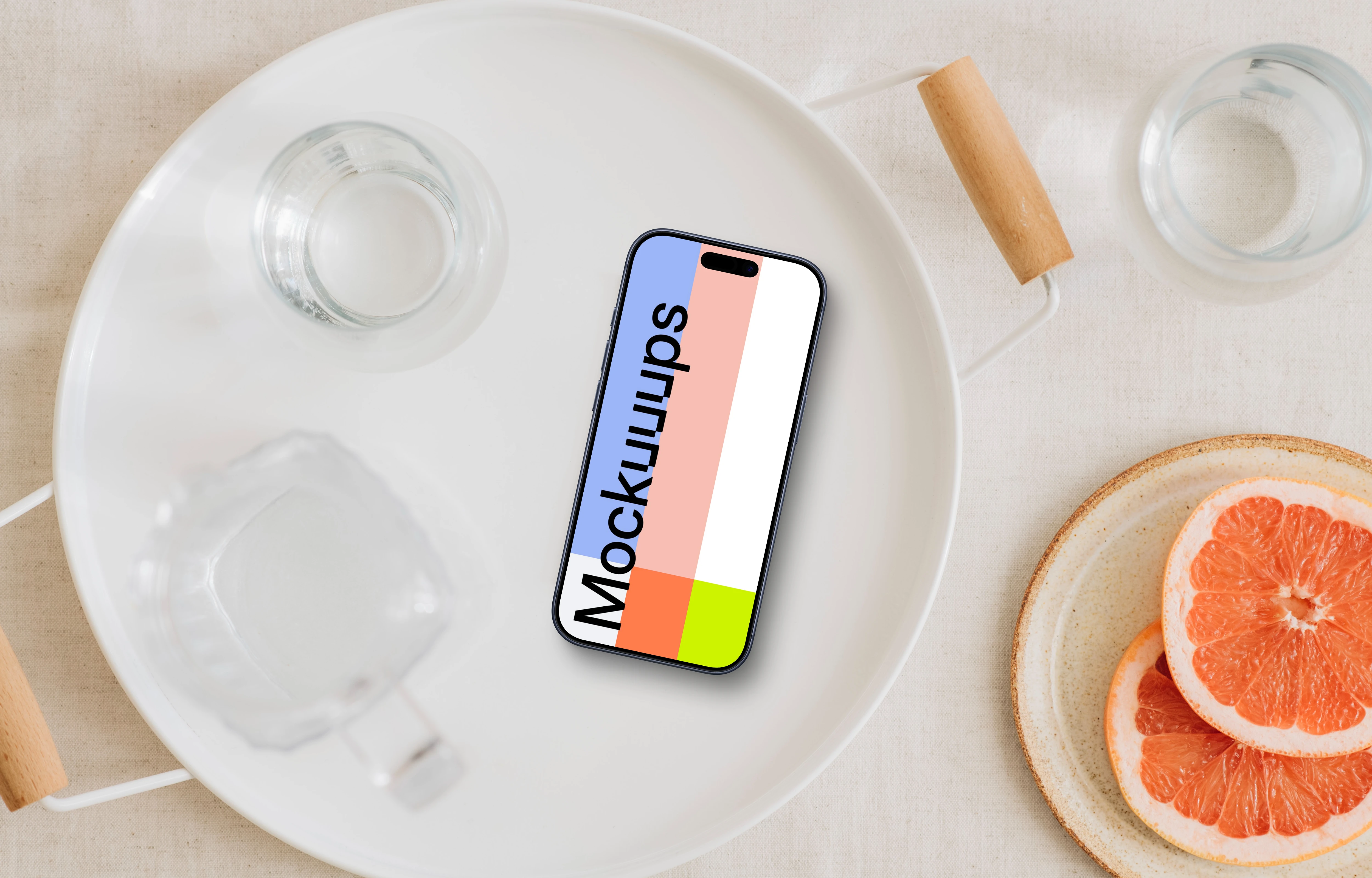 Minimalist table setting with an iPhone mockup