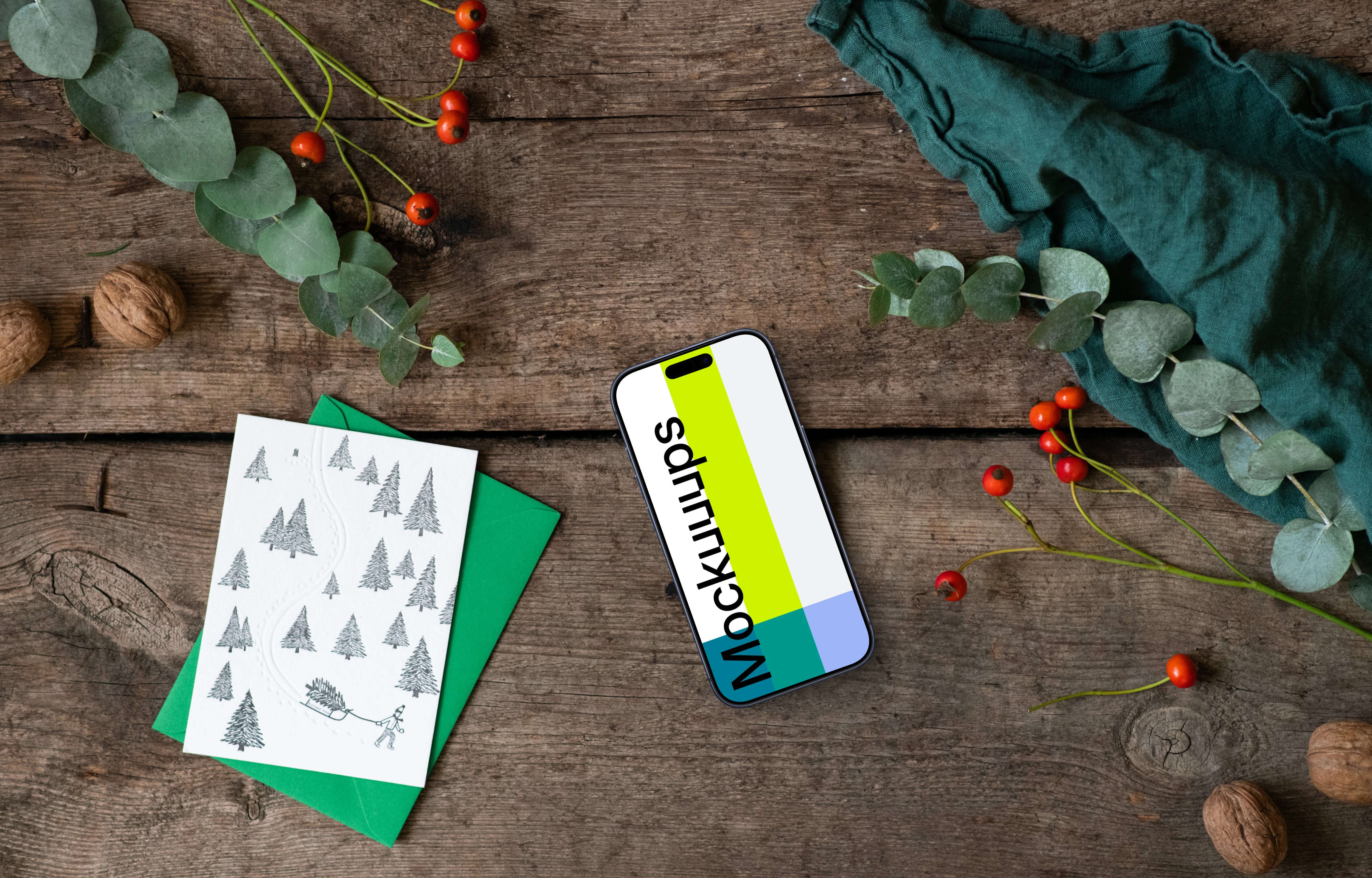 Christmas mockup with a phone and greeting card