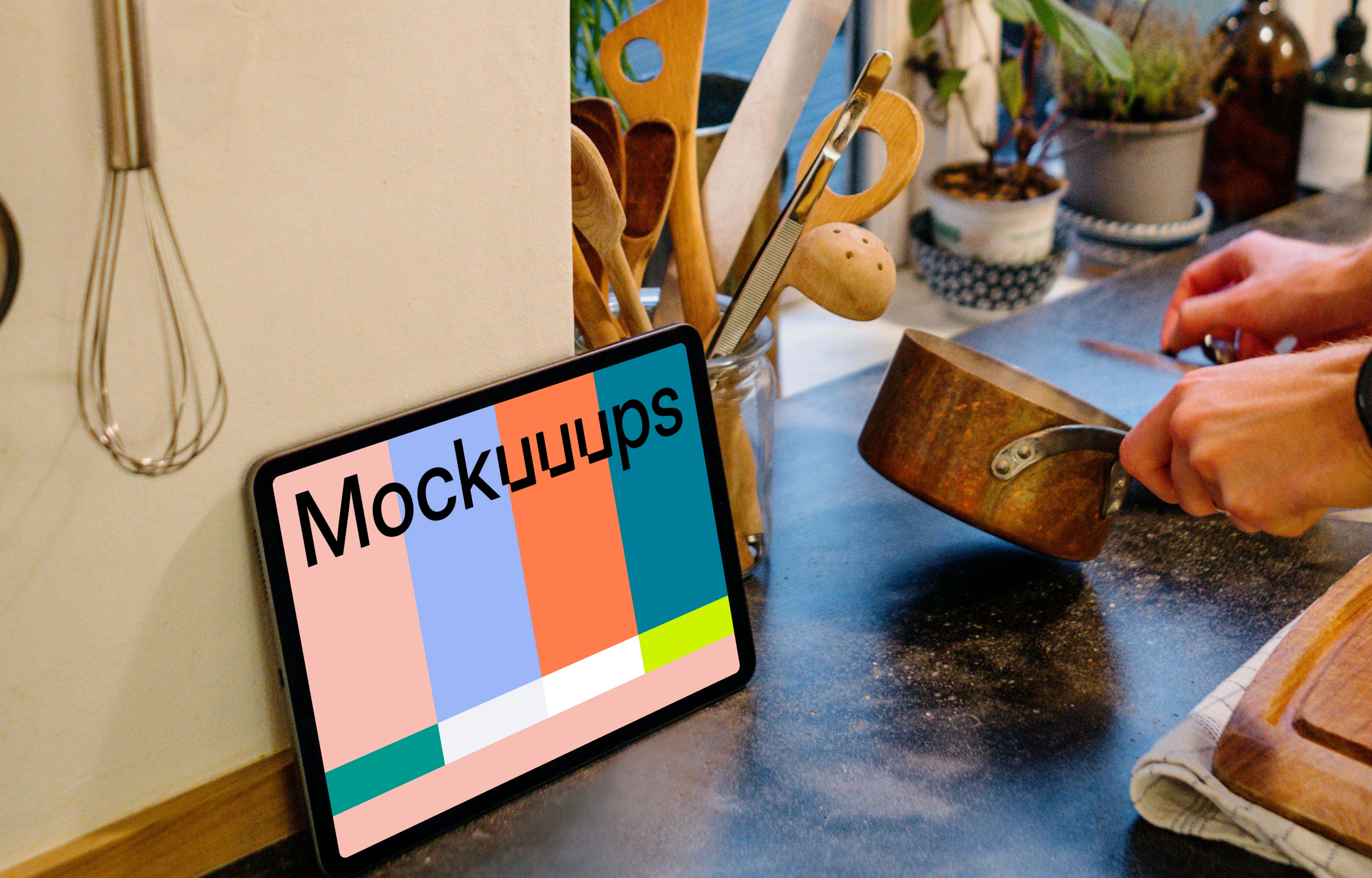 iPad Air mockup beside various cooking utensils