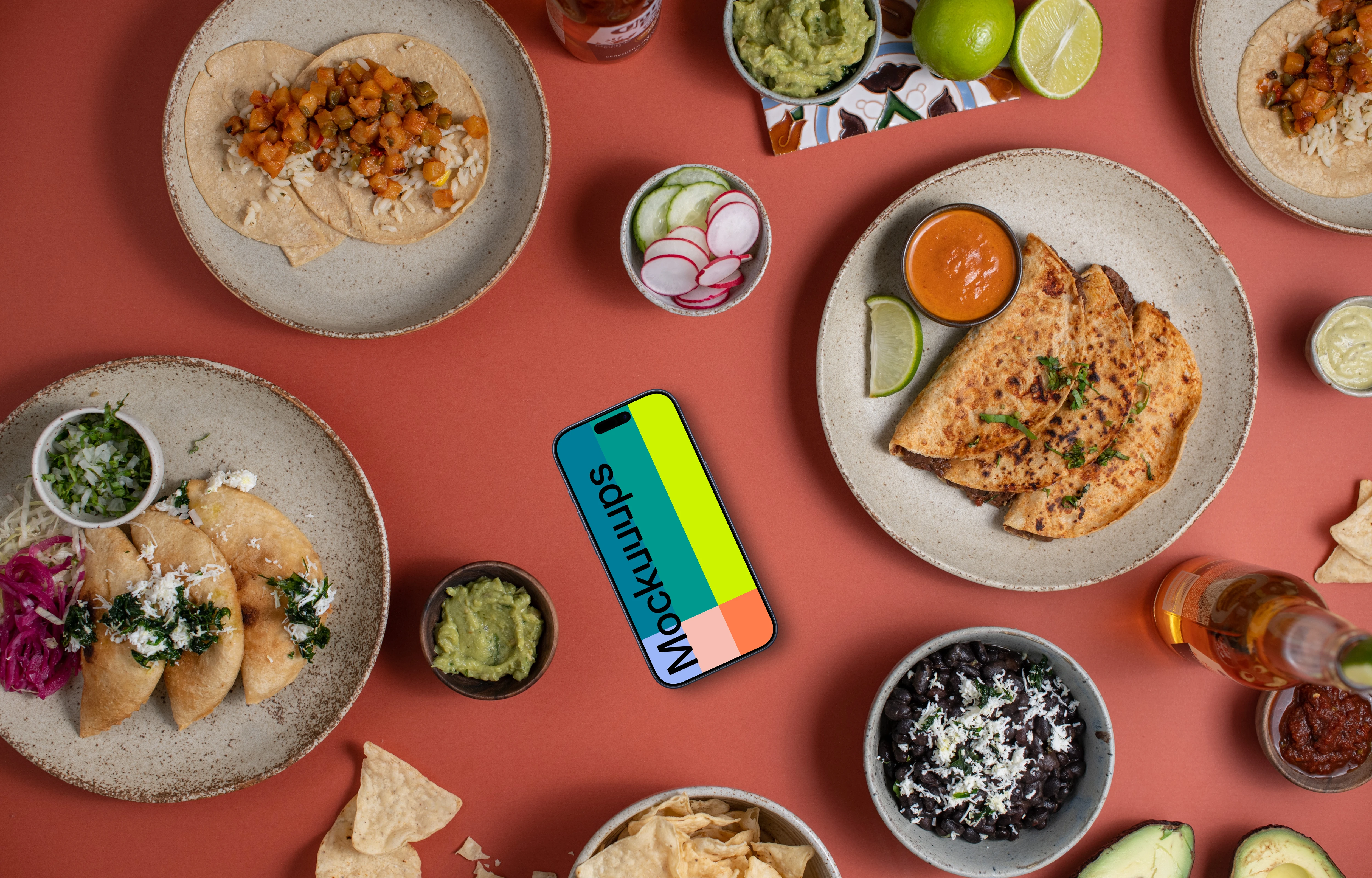 Phone mockup surrounded by Mexican food